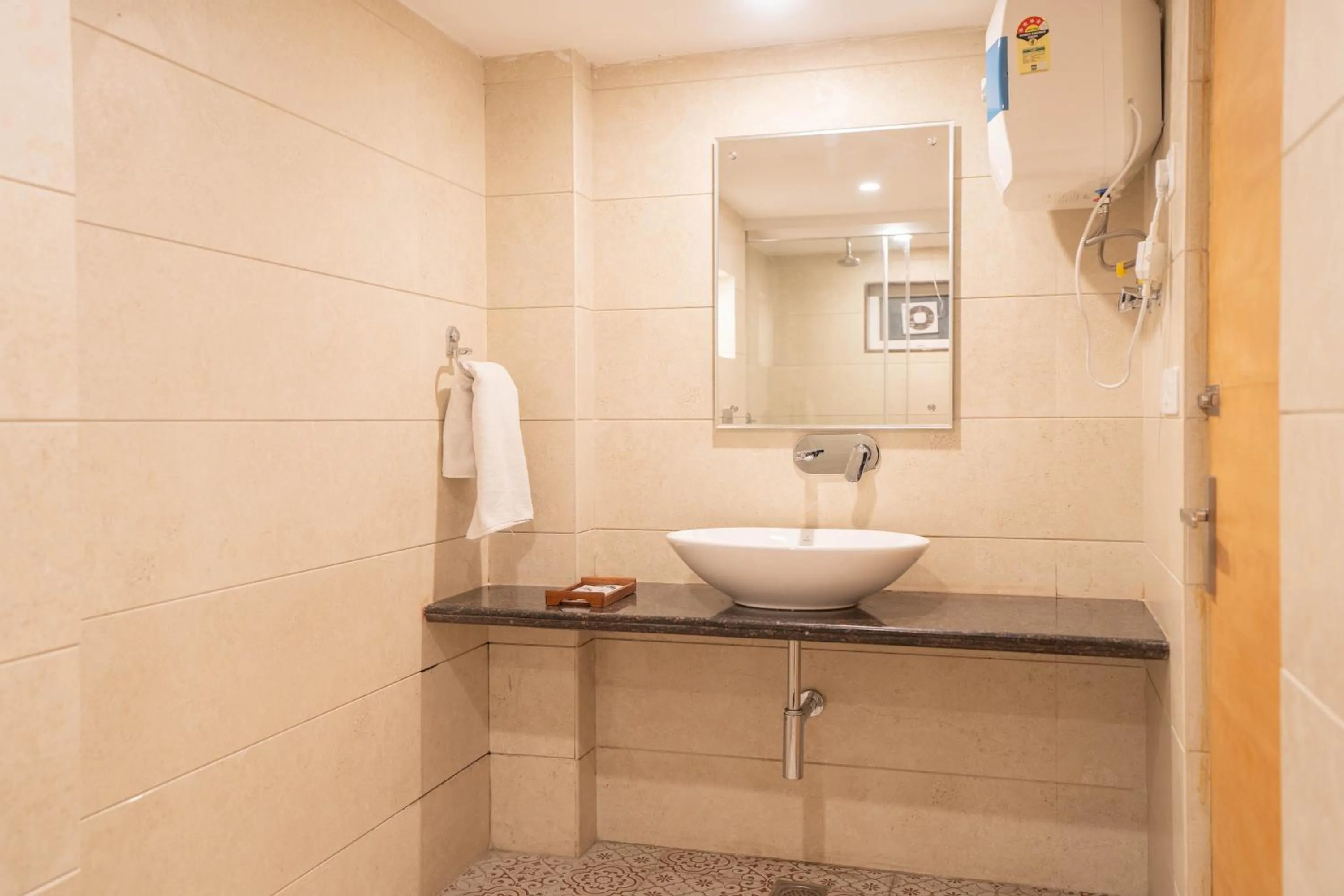 Bathroom in Super Hotel by Perfectstayz Mall Road