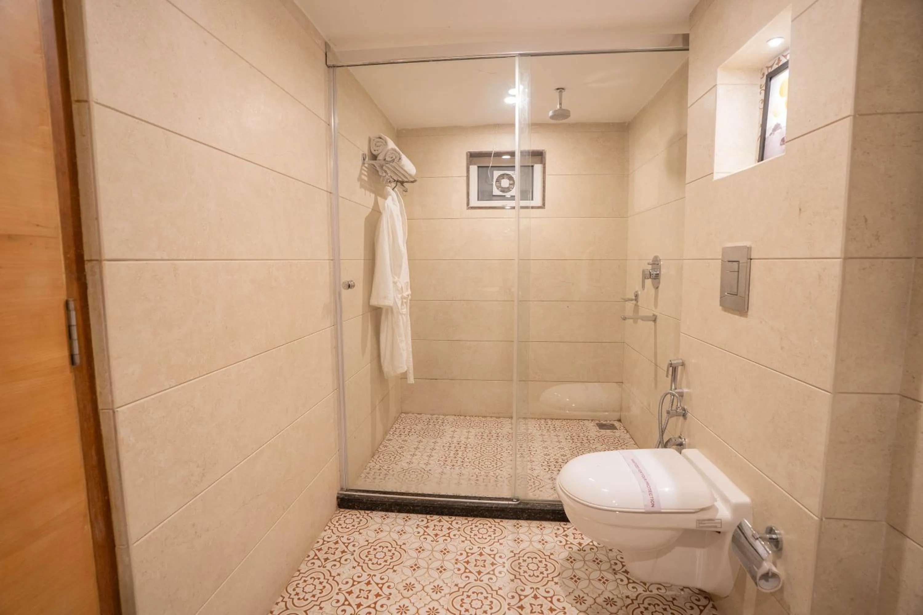 Shower in Super Hotel by Perfectstayz Mall Road