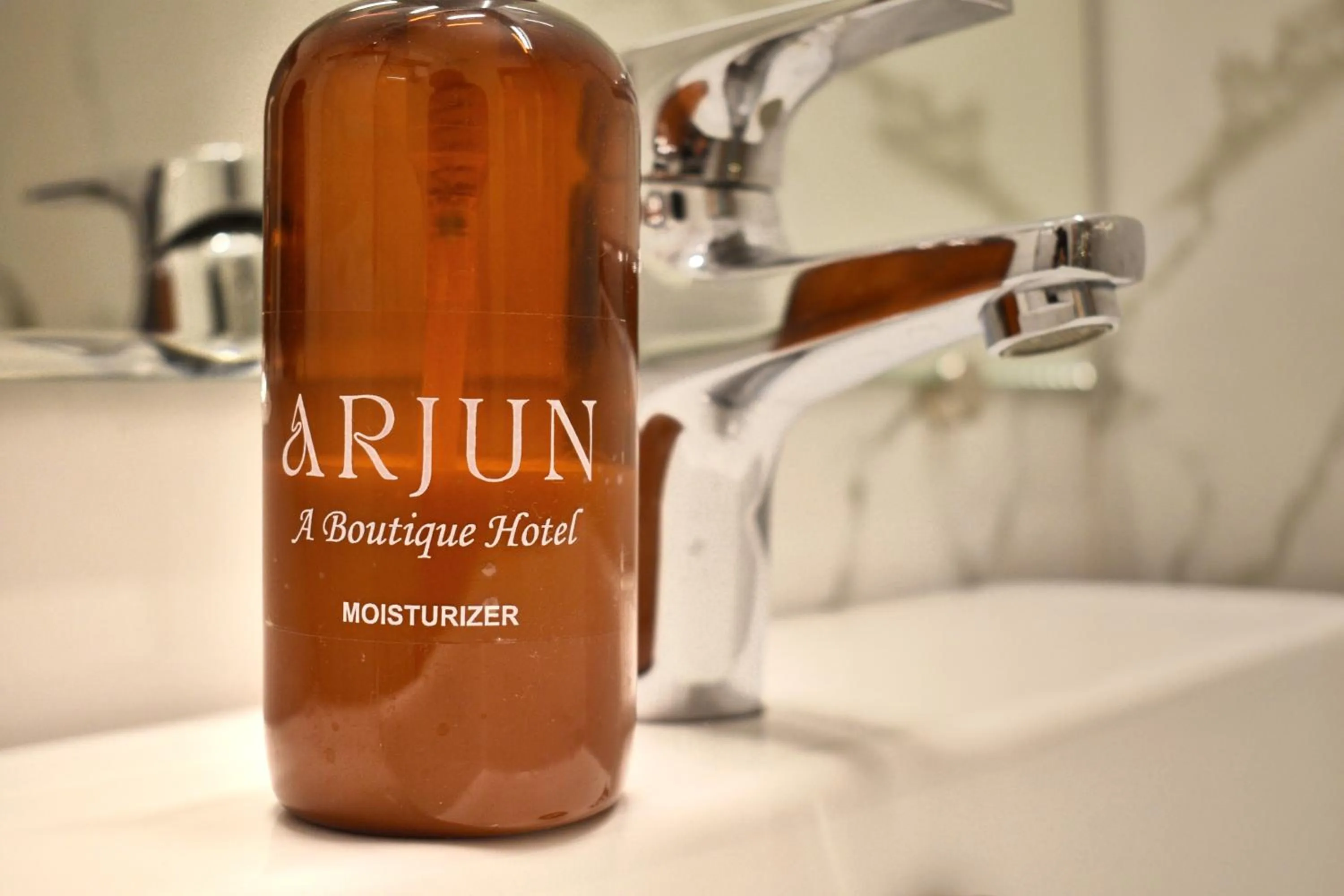 Property logo or sign in Arjun - A boutique hotel