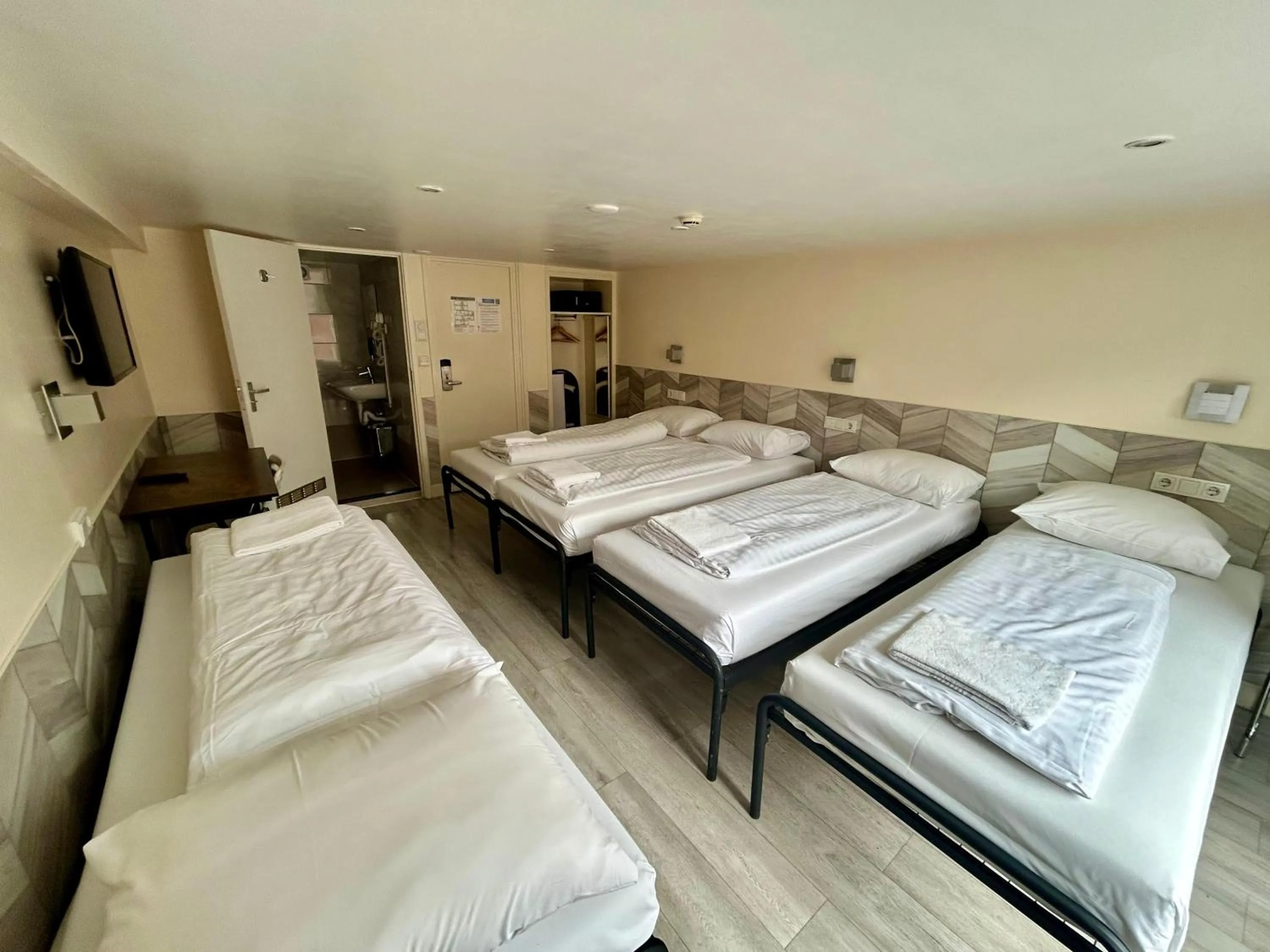 Bed in Hotel Damrak Inn