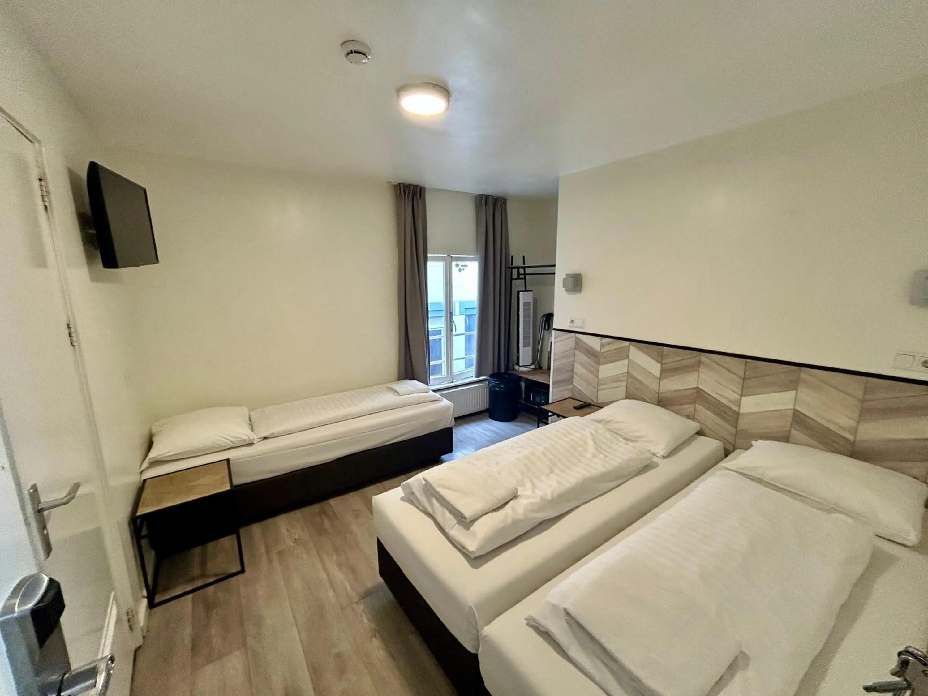 Bed in Hotel Damrak Inn