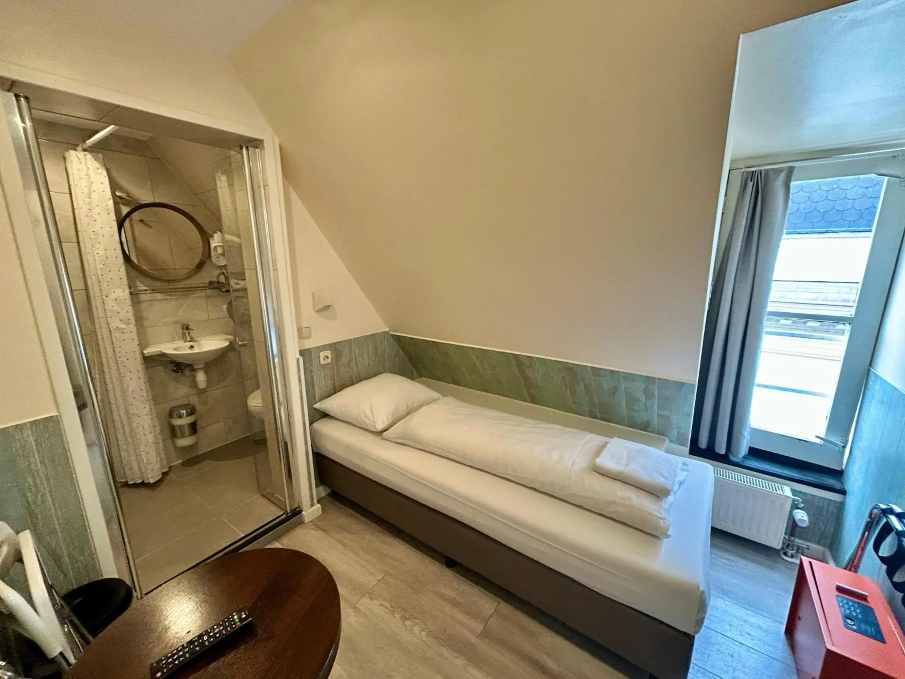 Bedroom, Bed in Hotel Damrak Inn Bedroom, Bed in Hotel Damrak Inn