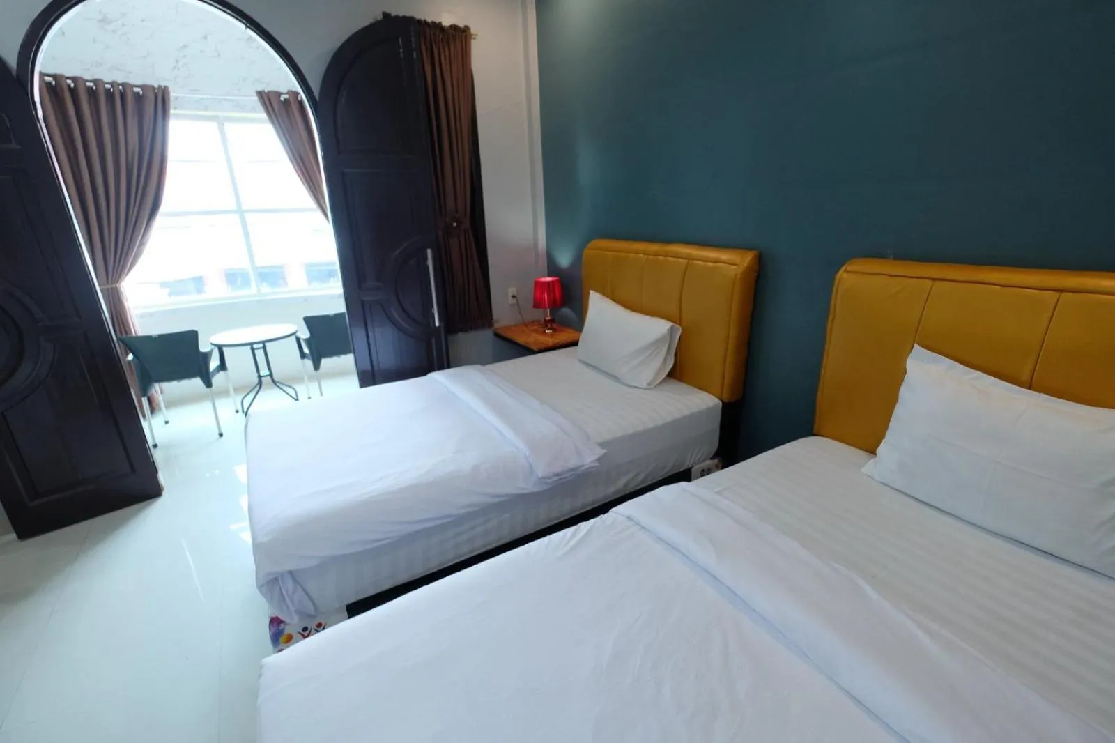 Bedroom, Bed in Grand Mulia Hotel Kisaran