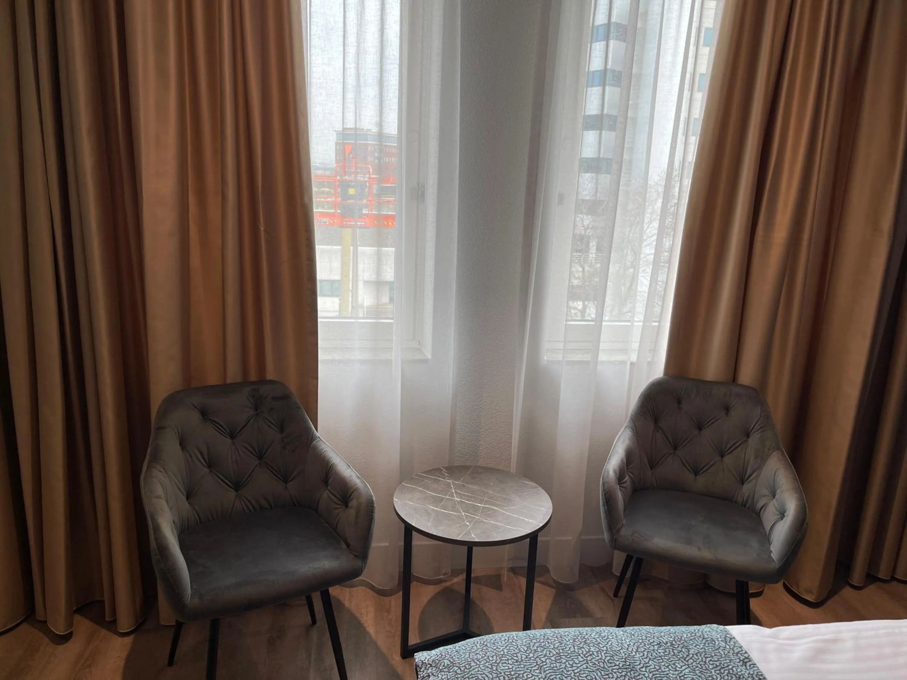 Seating area in OZO Hotels Antares Airport