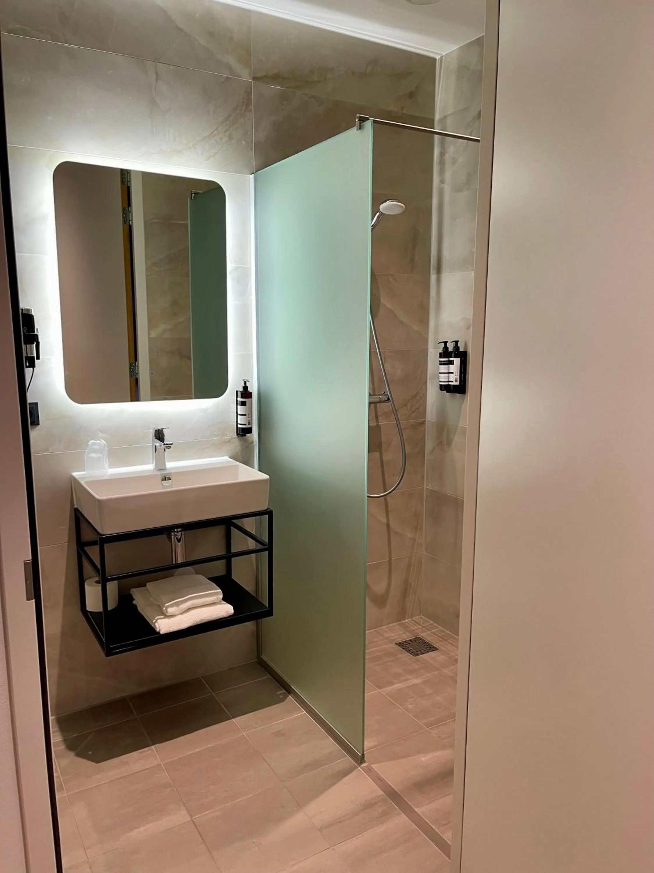 Bathroom in OZO Hotels Antares Airport