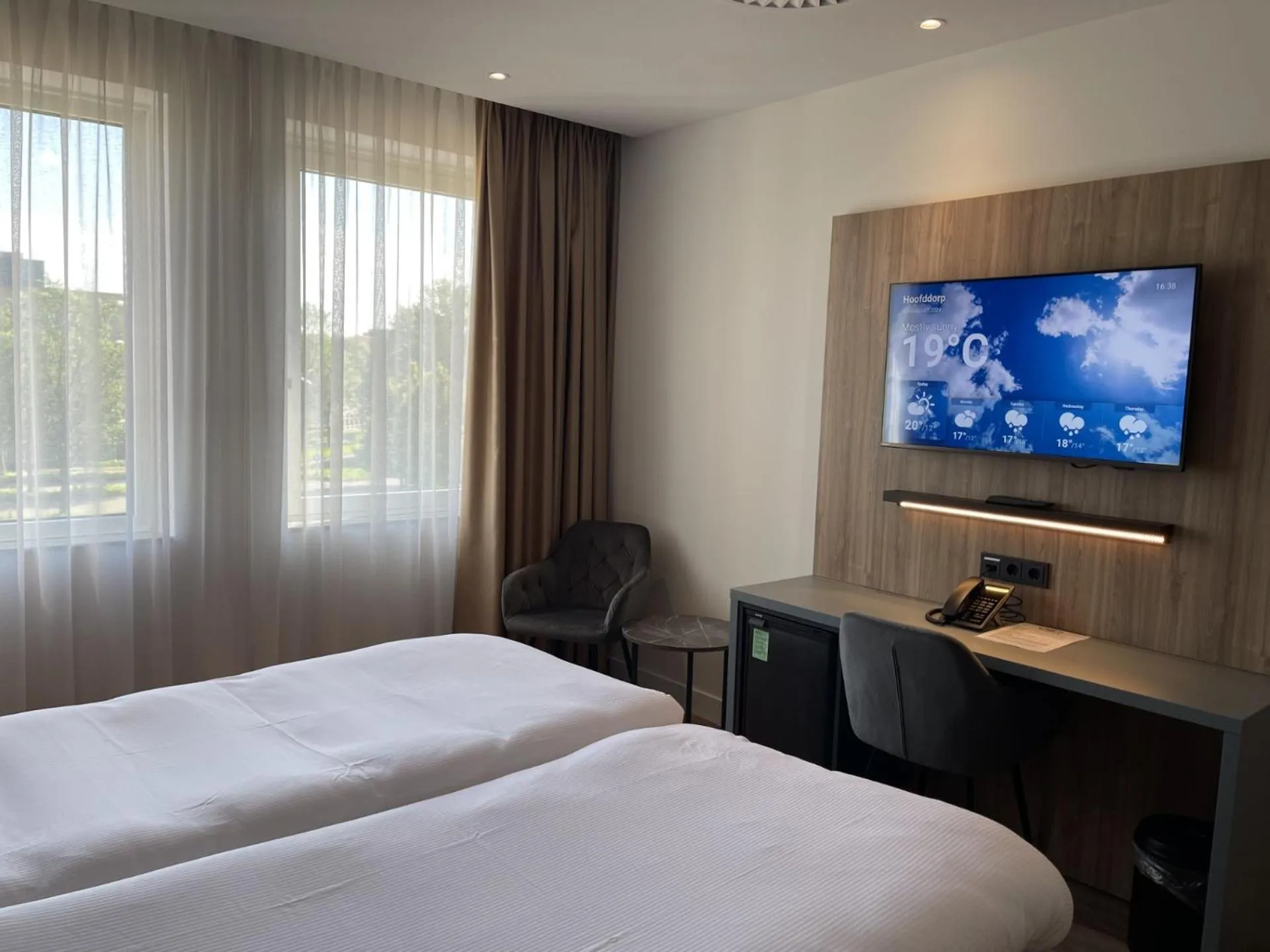 Bed in OZO Hotels Antares Airport