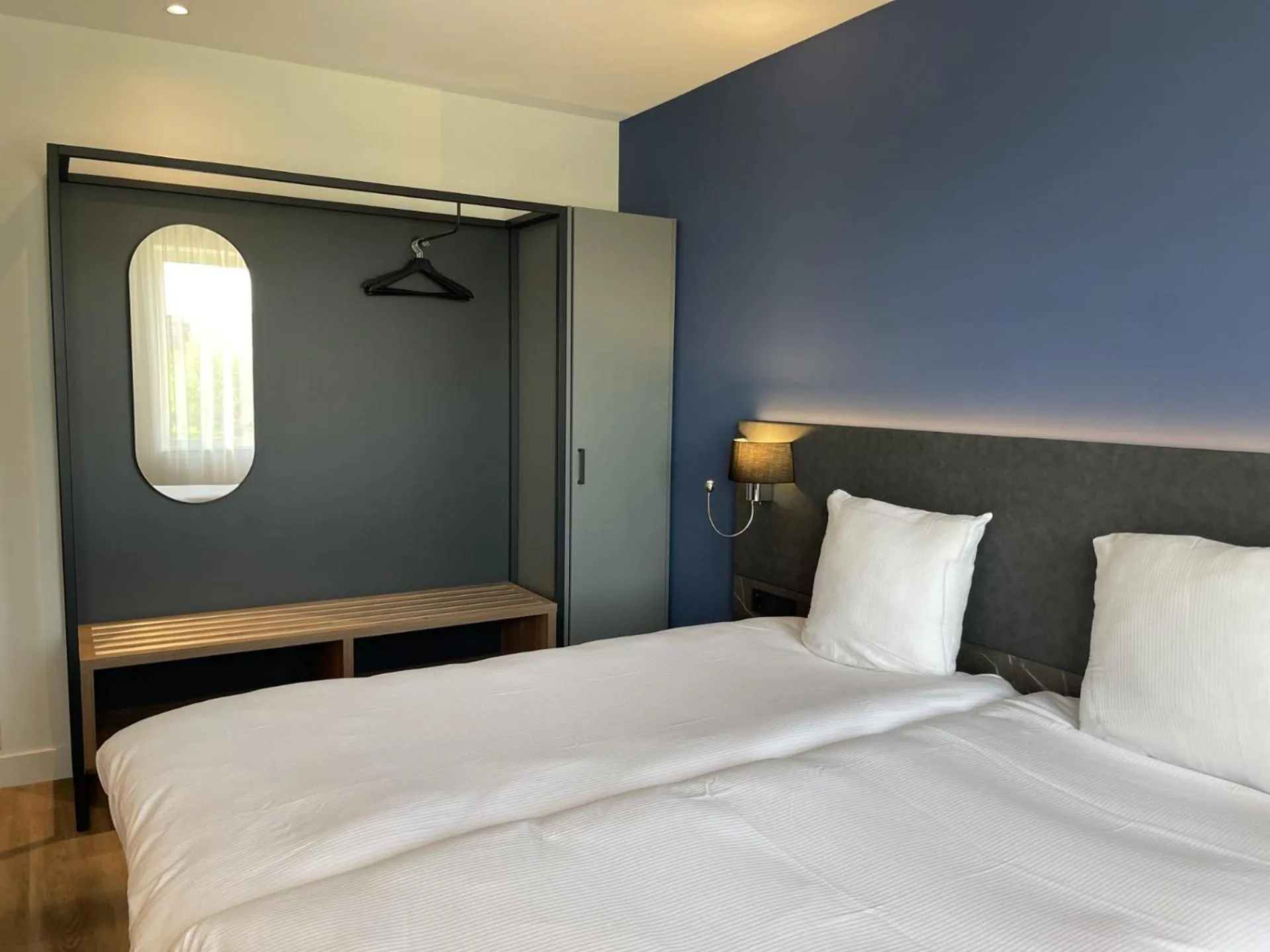 Bed in OZO Hotels Antares Airport