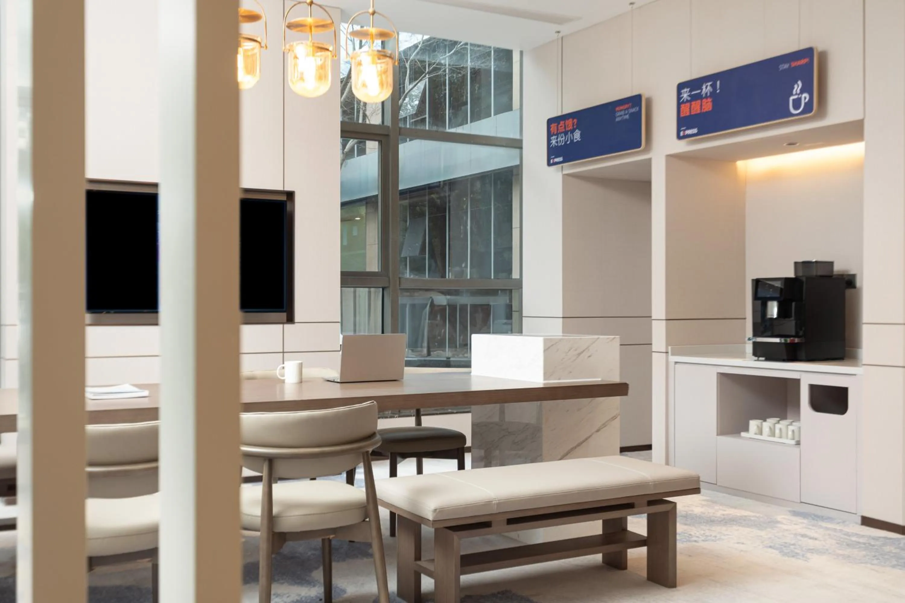 Seating area in Holiday Inn Express Shanghai Gumei by IHG