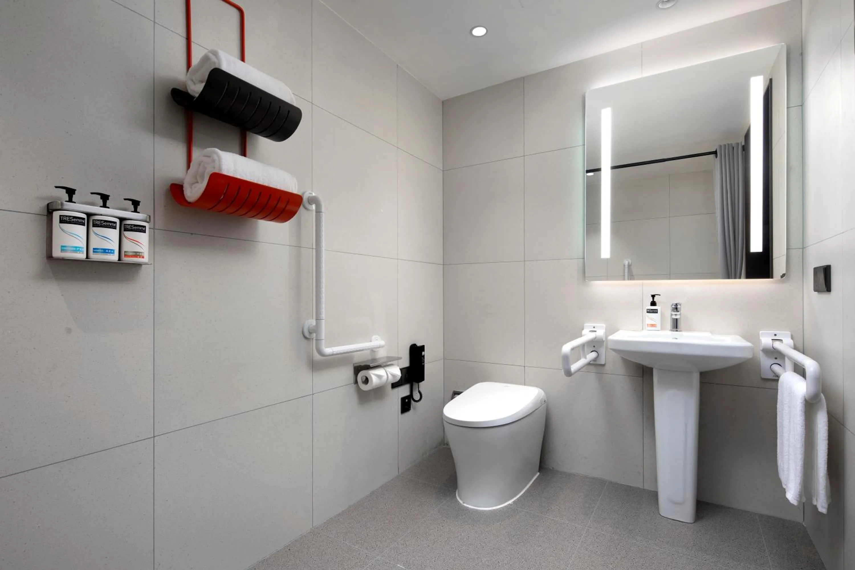 Toilet in Holiday Inn Express Shanghai Gumei by IHG