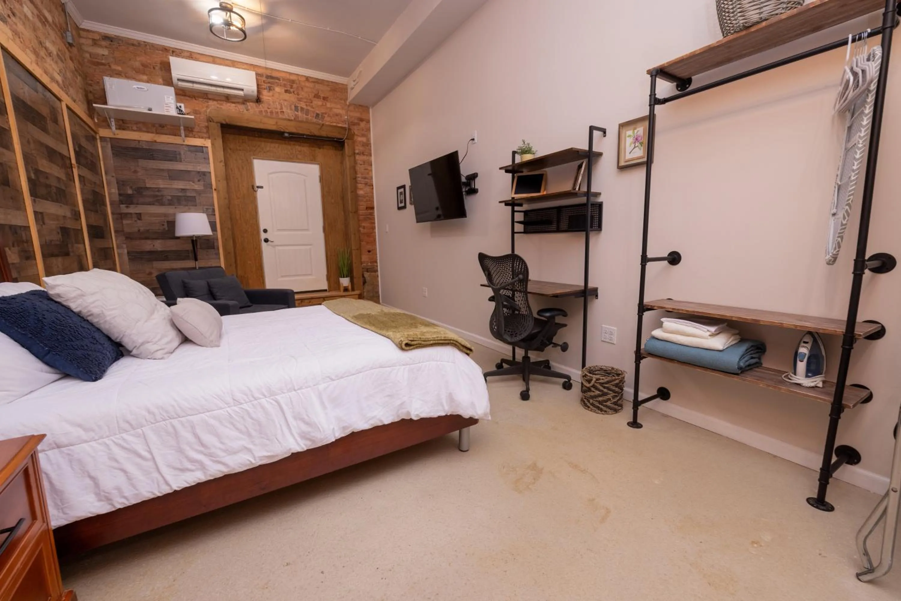 Bed in Hartwell Suites