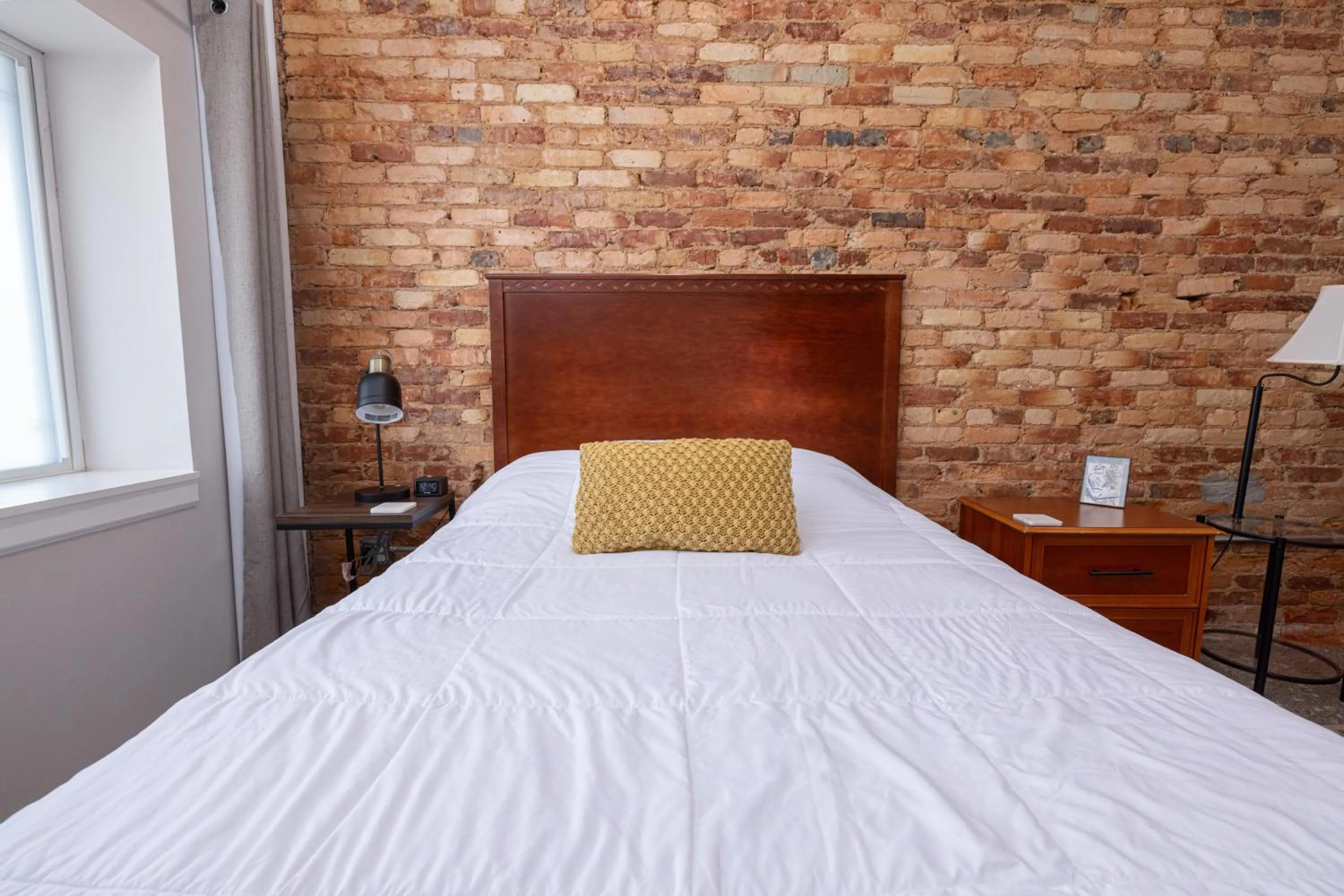 Bed in Hartwell Suites