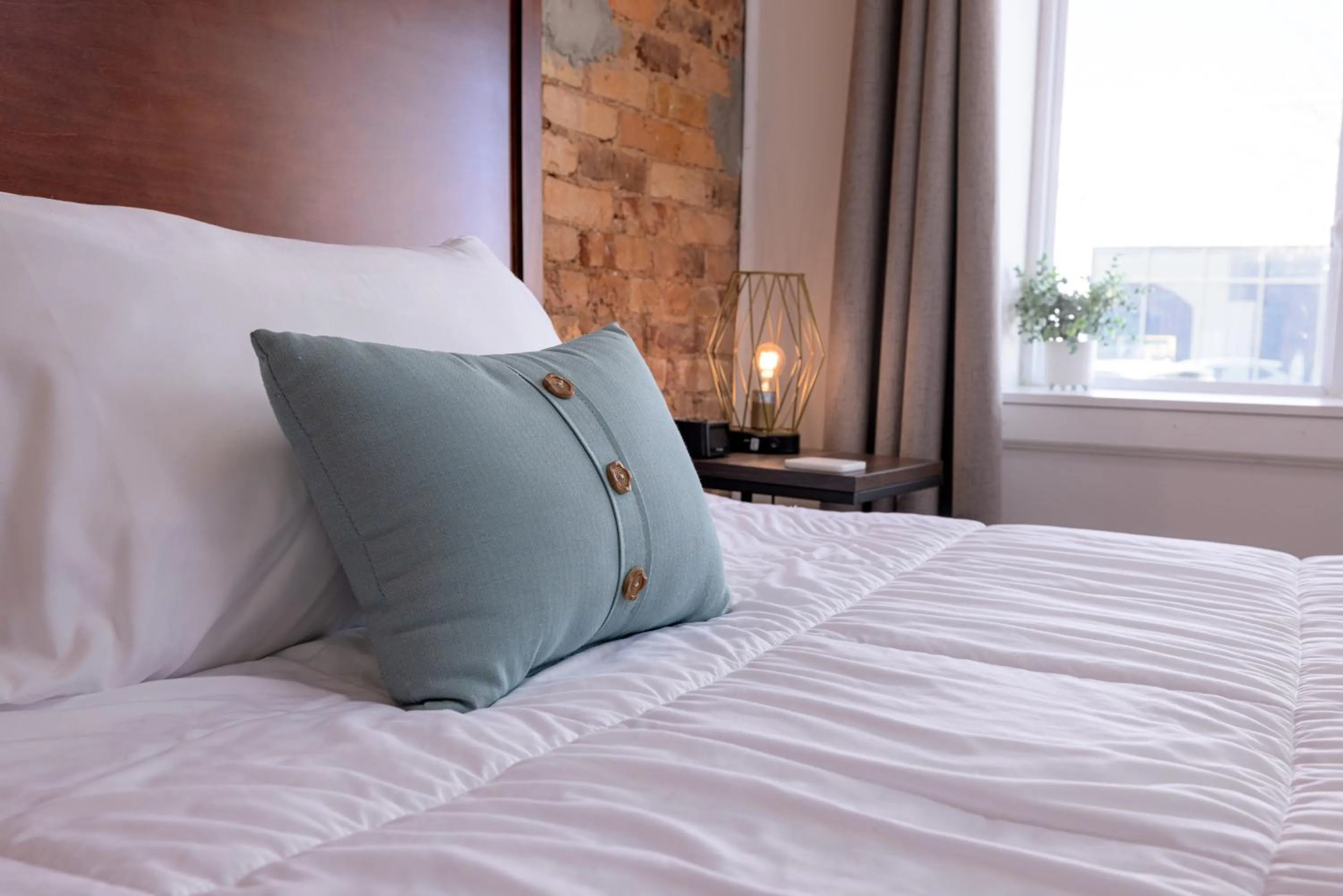 Bed in Hartwell Suites