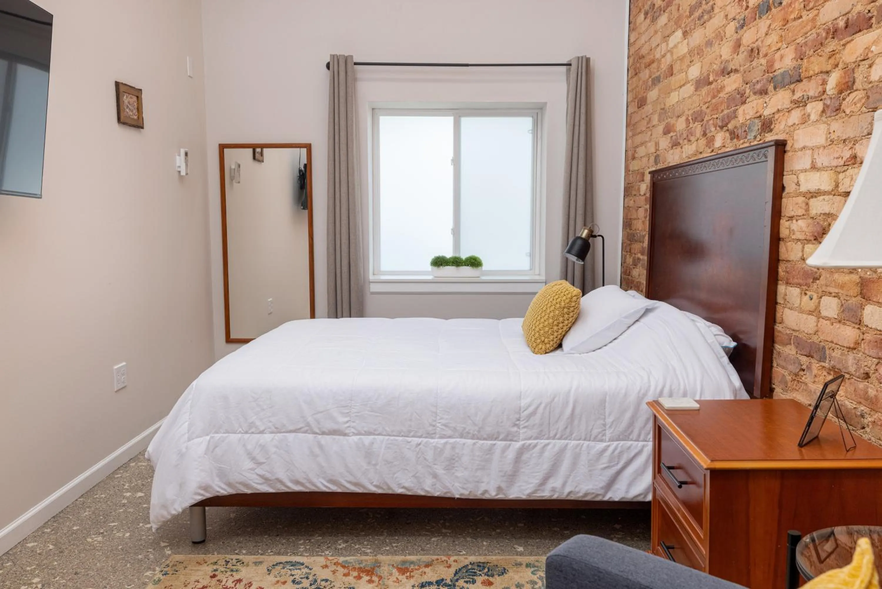 Bed in Hartwell Suites