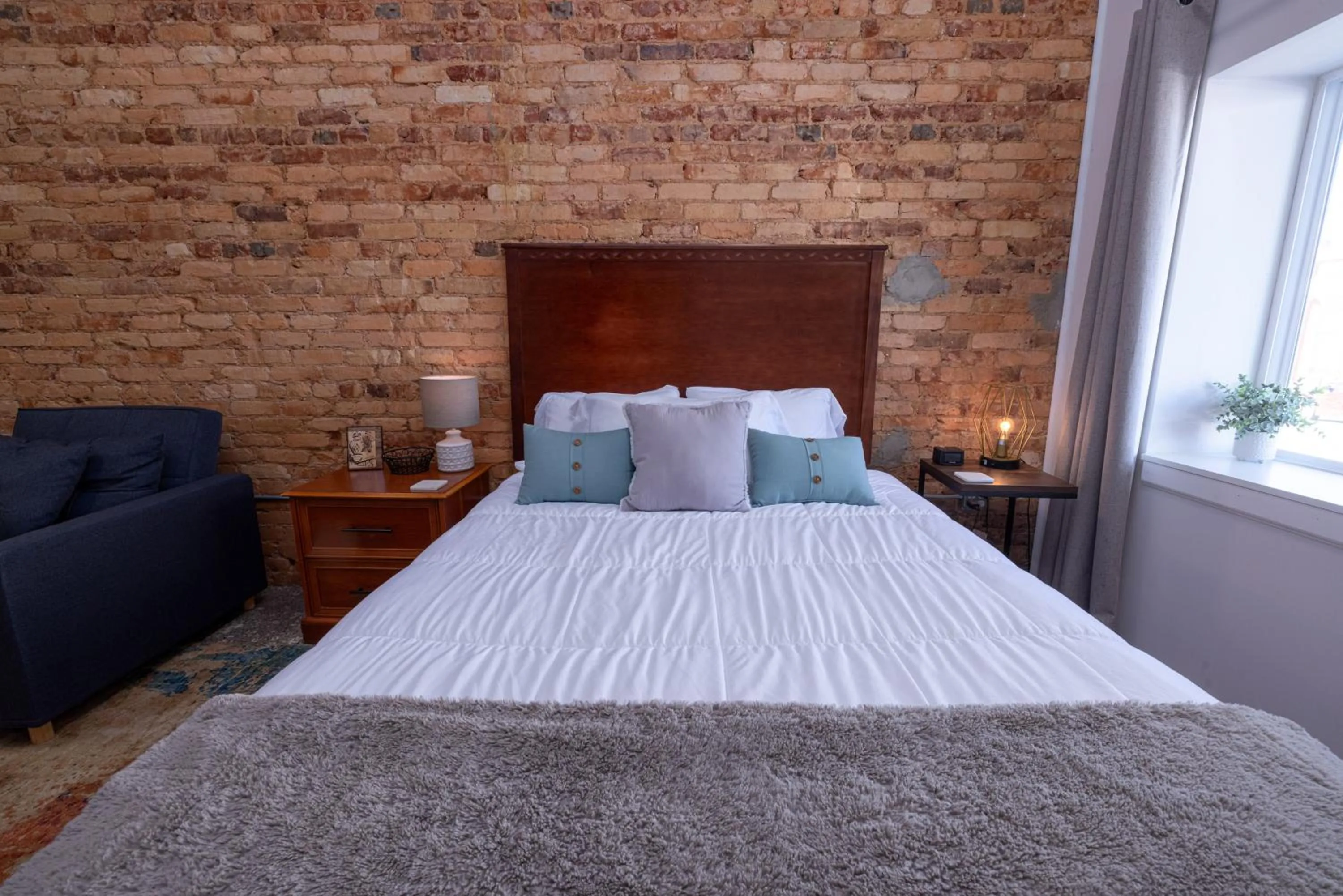 Bed in Hartwell Suites