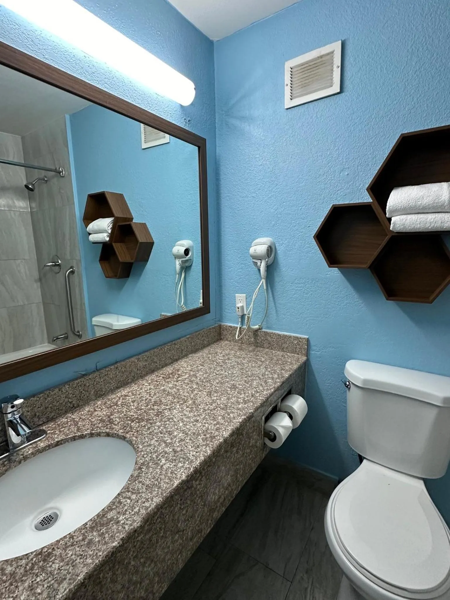 Bathroom in HomeTowne Studios by Red Roof Richmond, VA - W Broad St