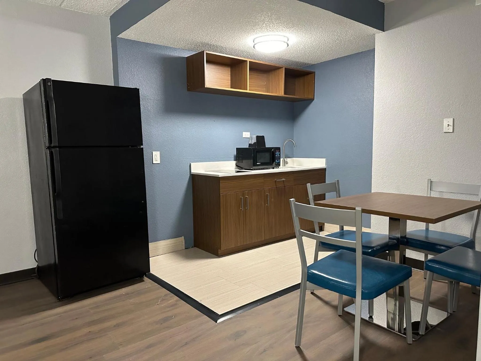 Photo of the whole room in HomeTowne Studios by Red Roof Richmond, VA - W Broad St