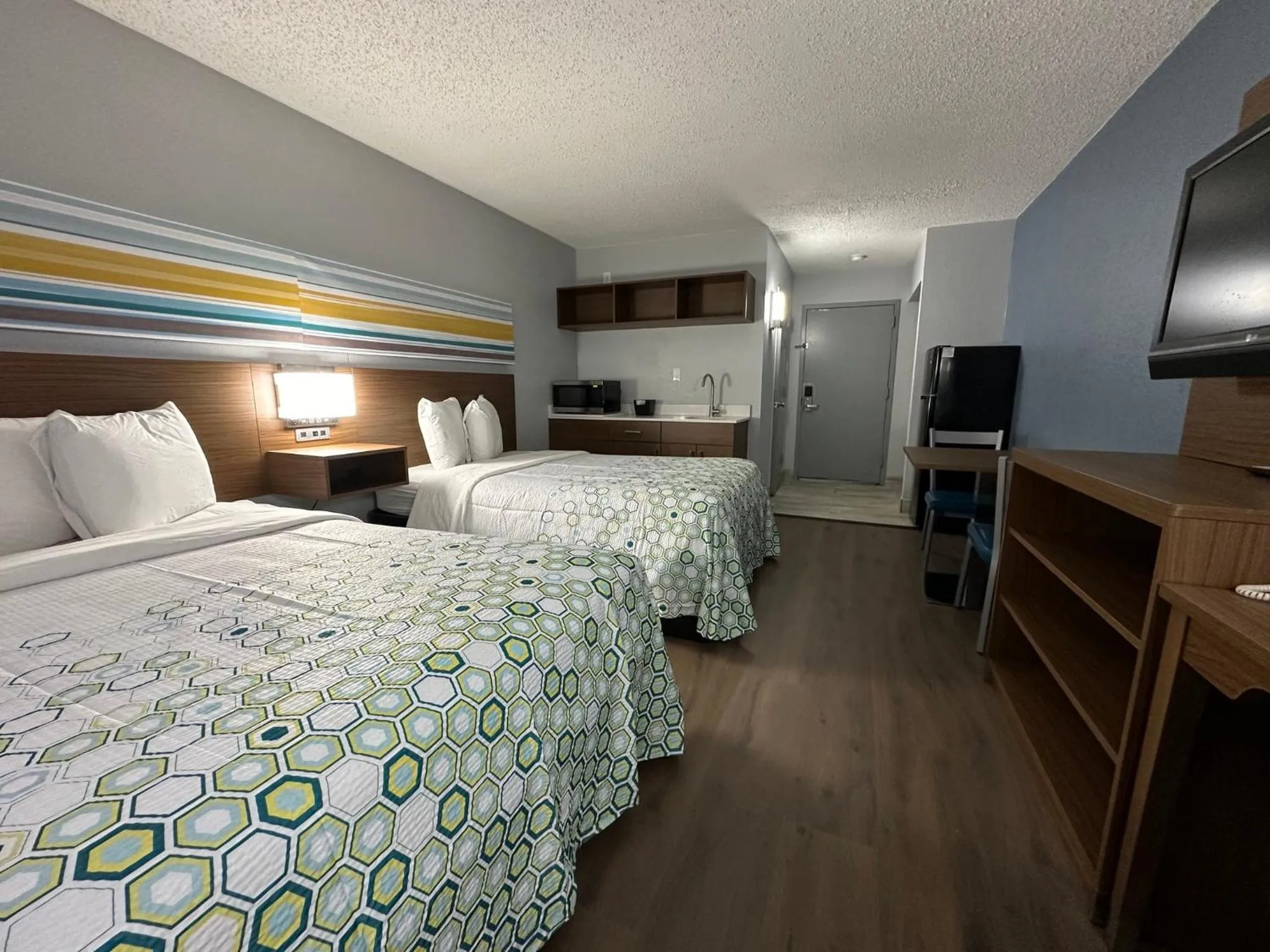 Photo of the whole room, Bed in HomeTowne Studios by Red Roof Richmond, VA - W Broad St