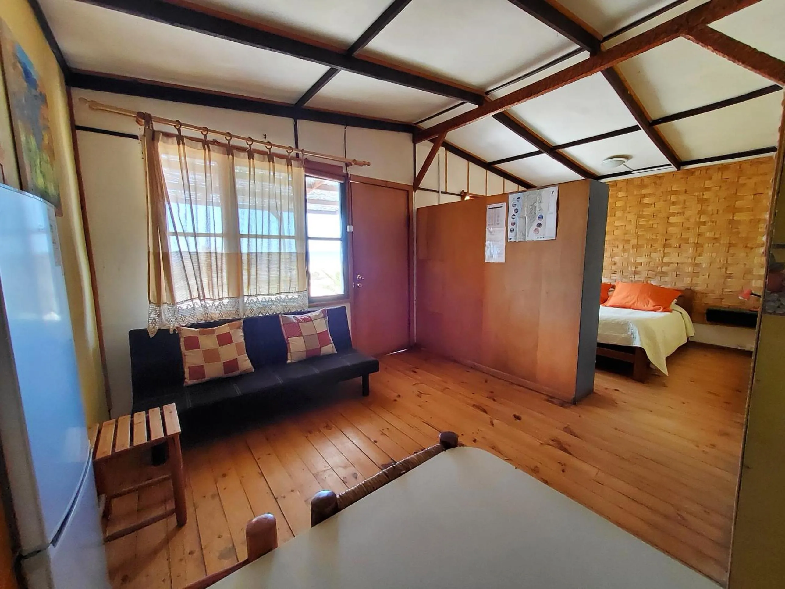 Seating area, Bed in Cabañas Paraiso
