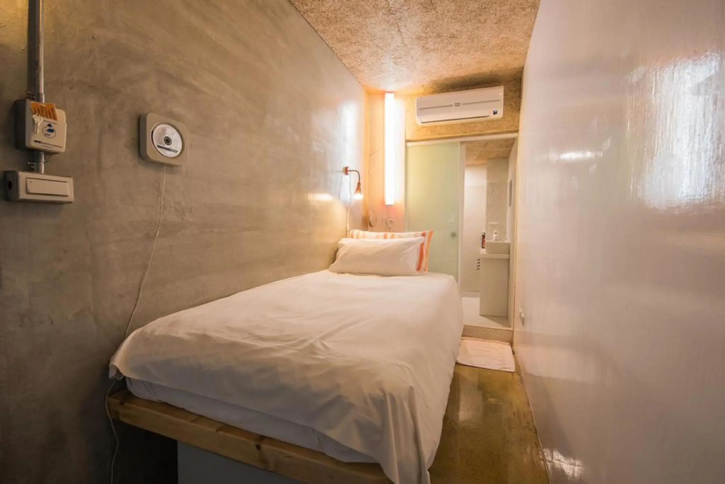 Bed in 墾丁橘月Orange Moon Inn Bed in 墾丁橘月Orange Moon Inn