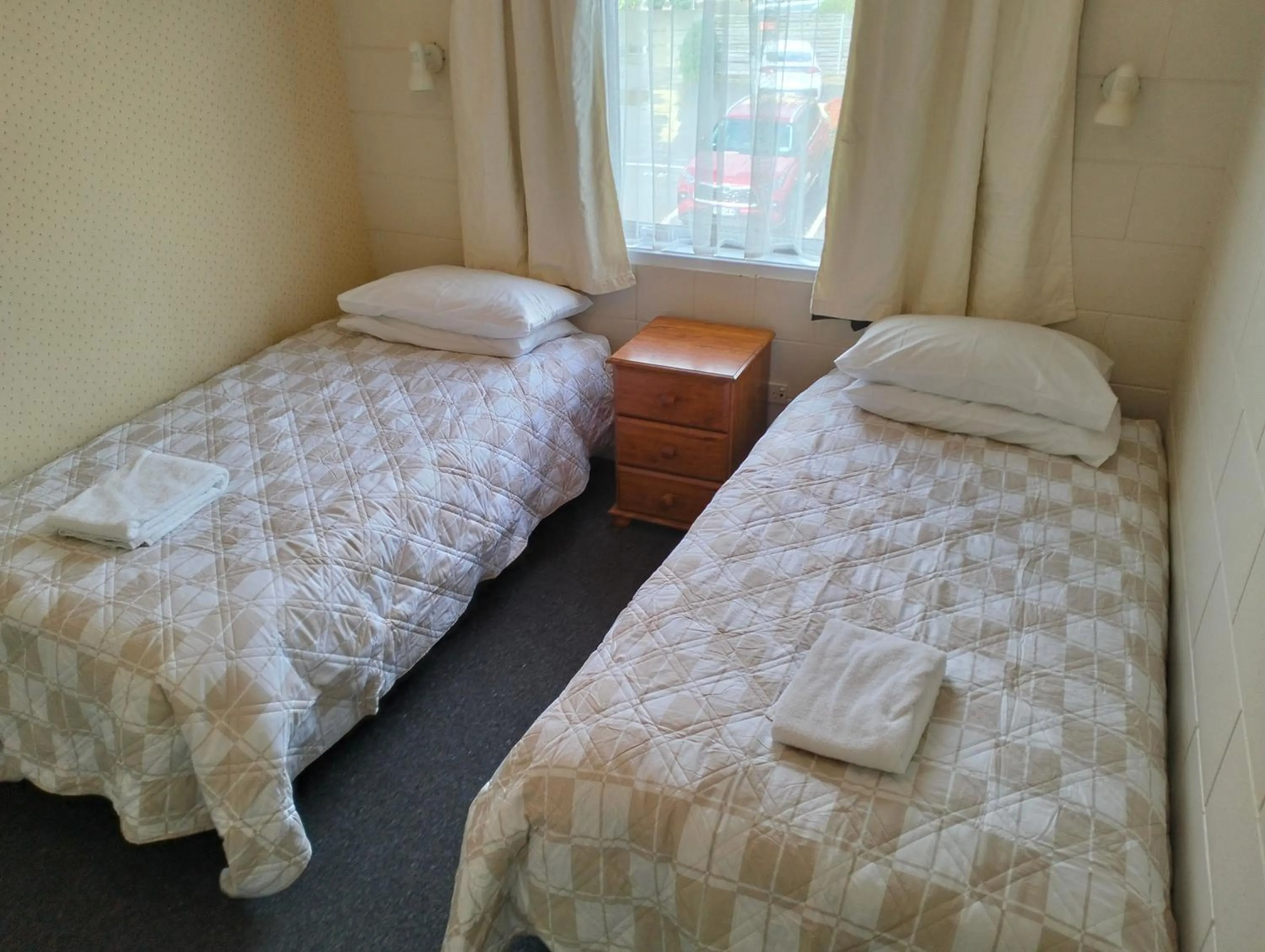 Bed in Akaroa Village Inn