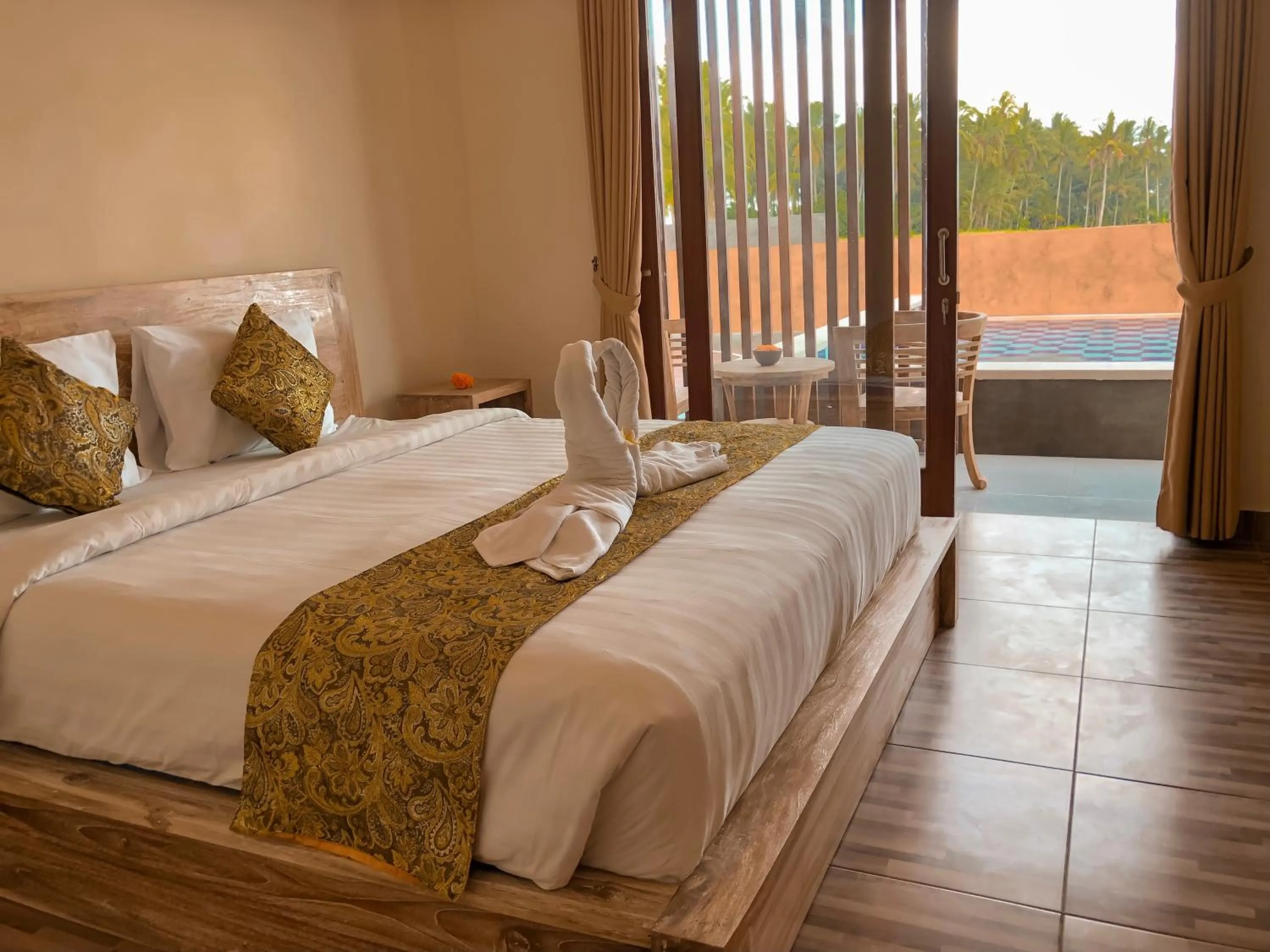 Bed in The Sawah Resort & Villa