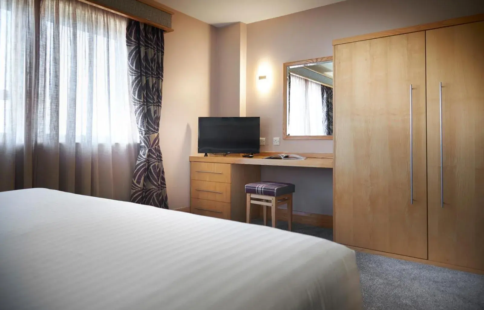 TV and multimedia, Bed in Best Western Premier Knowsley Suites Hotel & Spa TV and multimedia, Bed in Best Western Premier Knowsley Suites Hotel & Spa