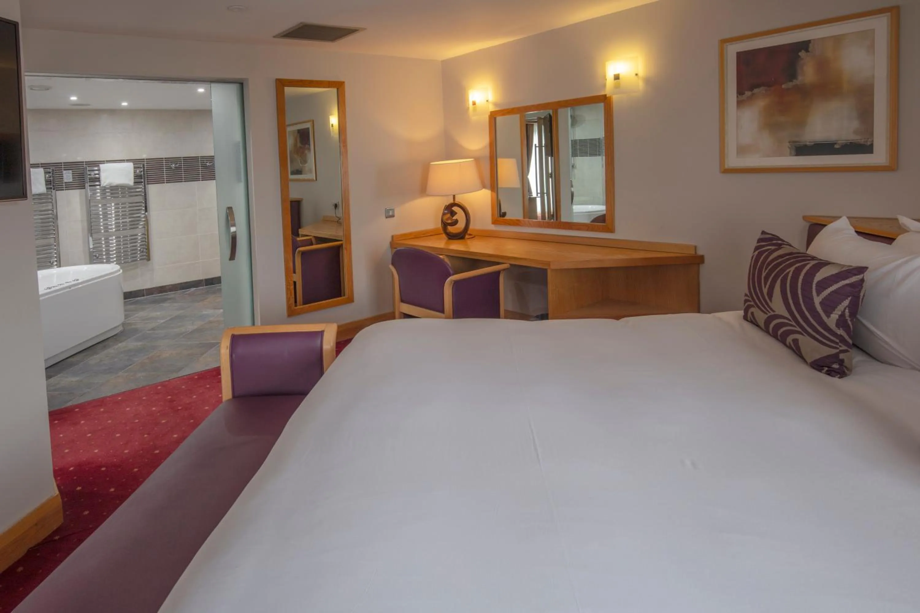 Seating area, Bed in Best Western Premier Knowsley Suites Hotel & Spa