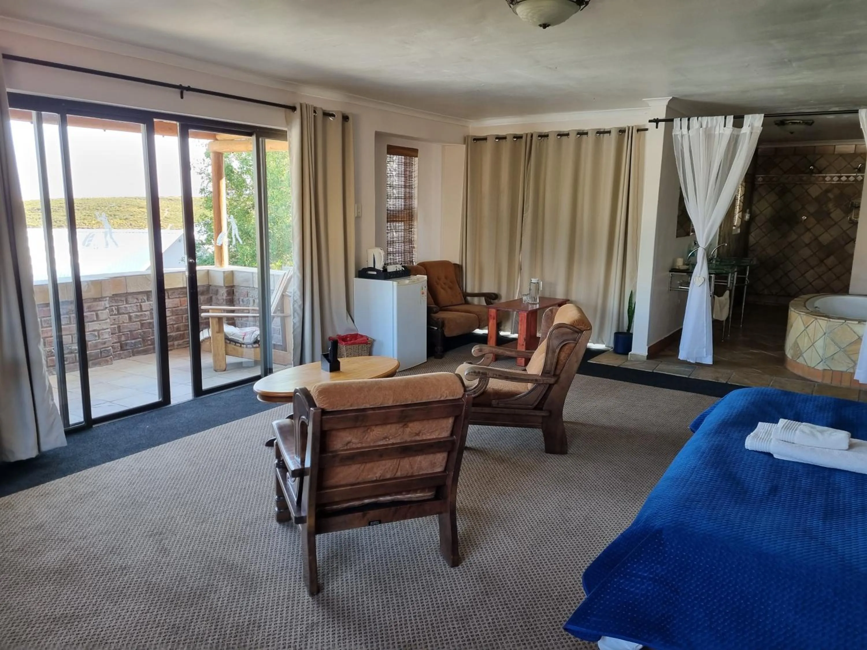 Seating area, Bed in 19th Hole Golf Villa Guesthouse