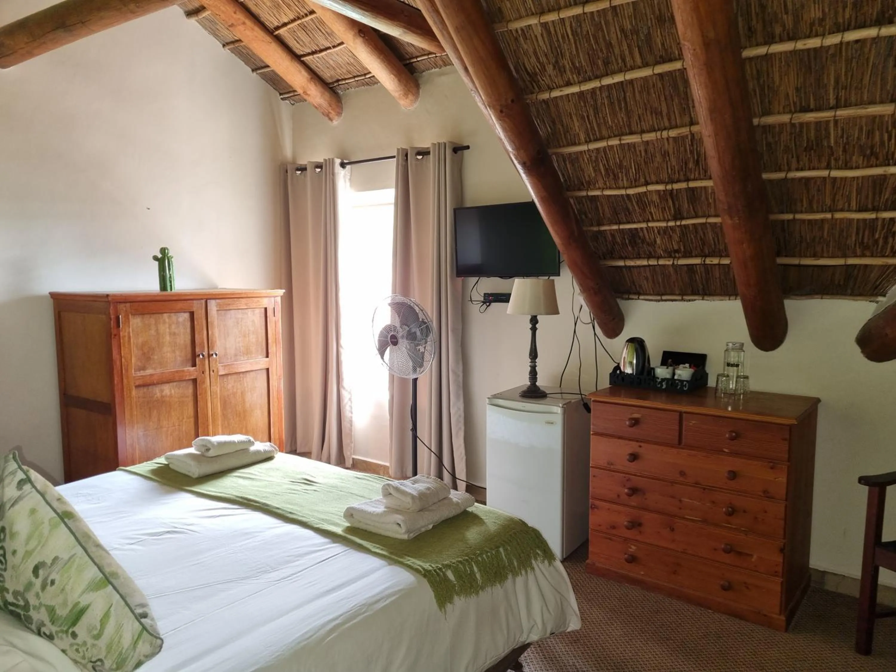 Photo of the whole room, Bed in 19th Hole Golf Villa Guesthouse