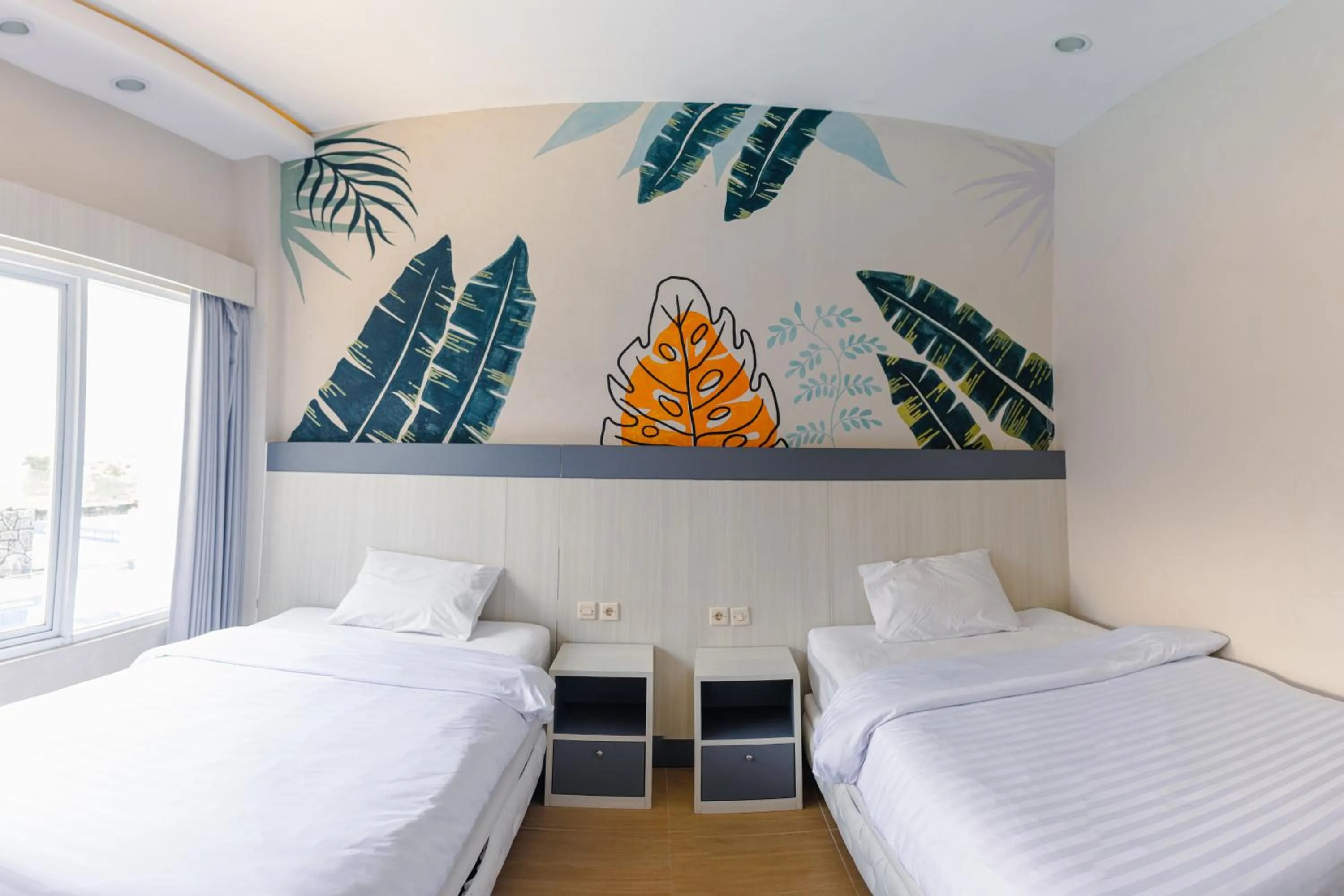 Bedroom, Bed in Azana BeSt Hotel Batu