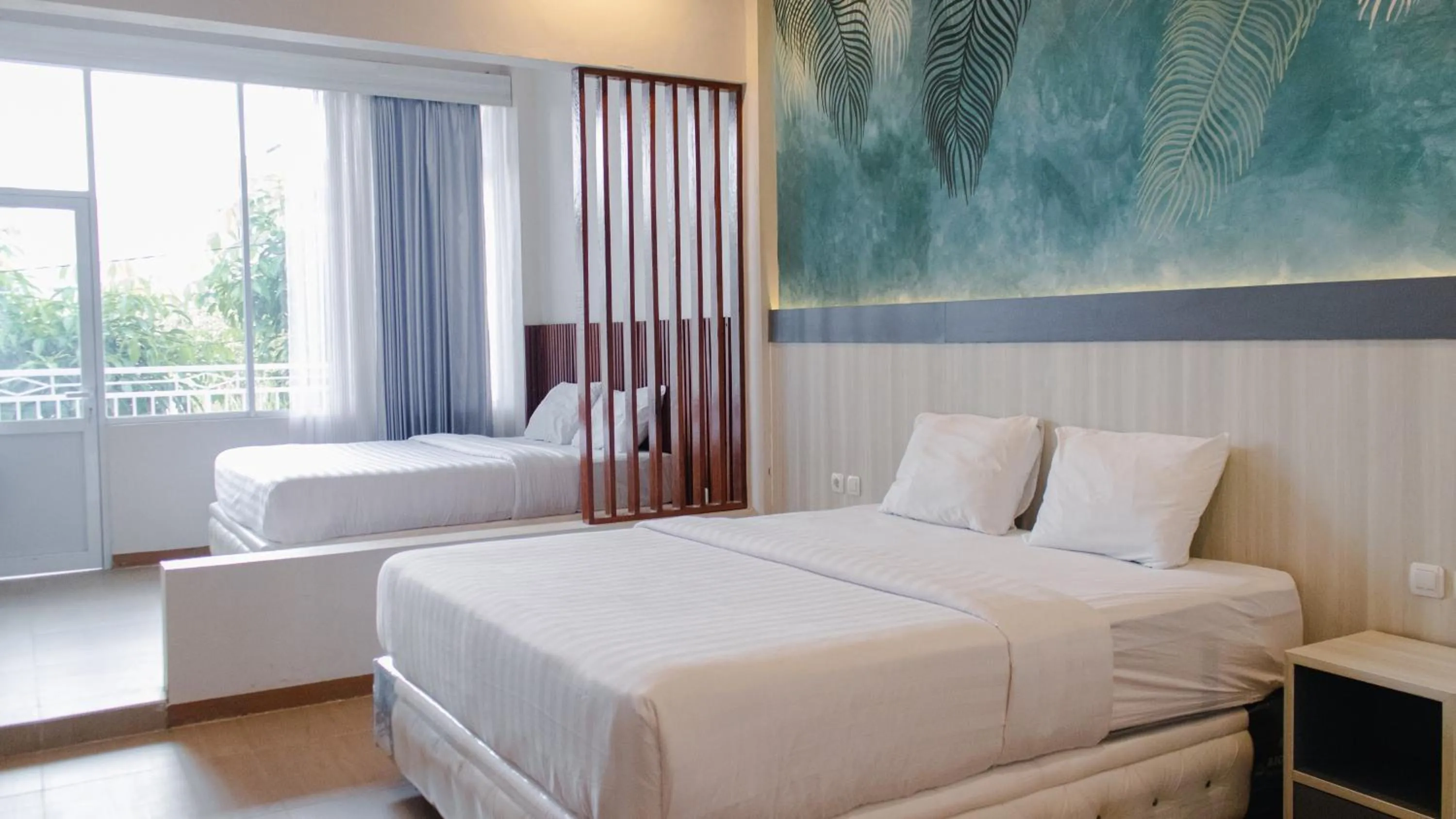 Bedroom, Bed in Azana BeSt Hotel Batu