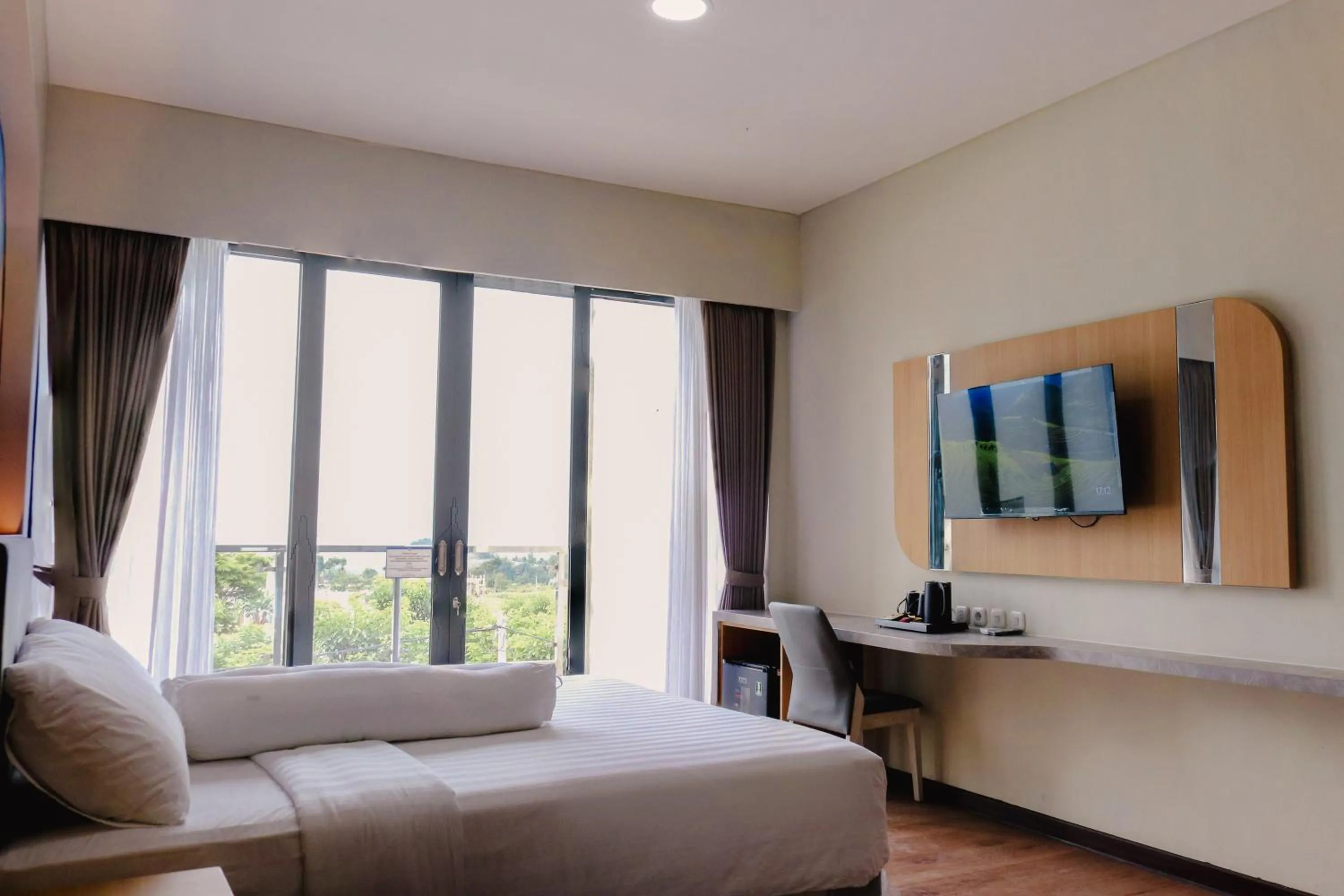 Bedroom in Azana BeSt Hotel Batu