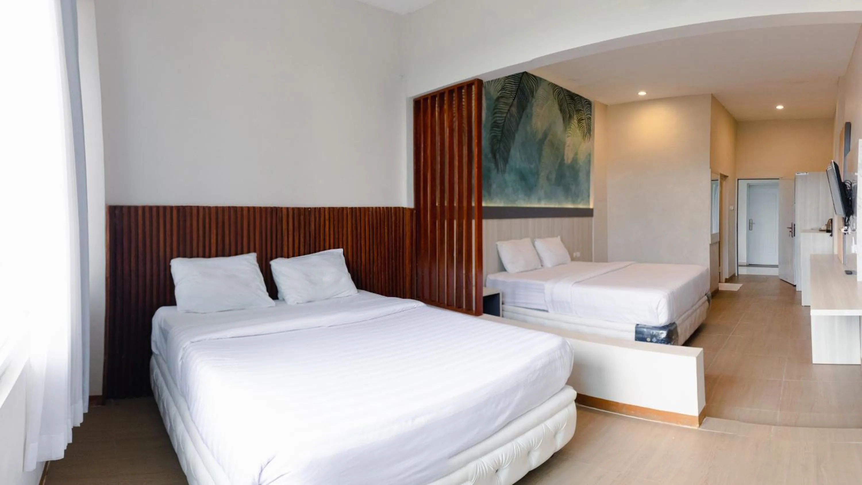 Bedroom, Bed in Azana BeSt Hotel Batu