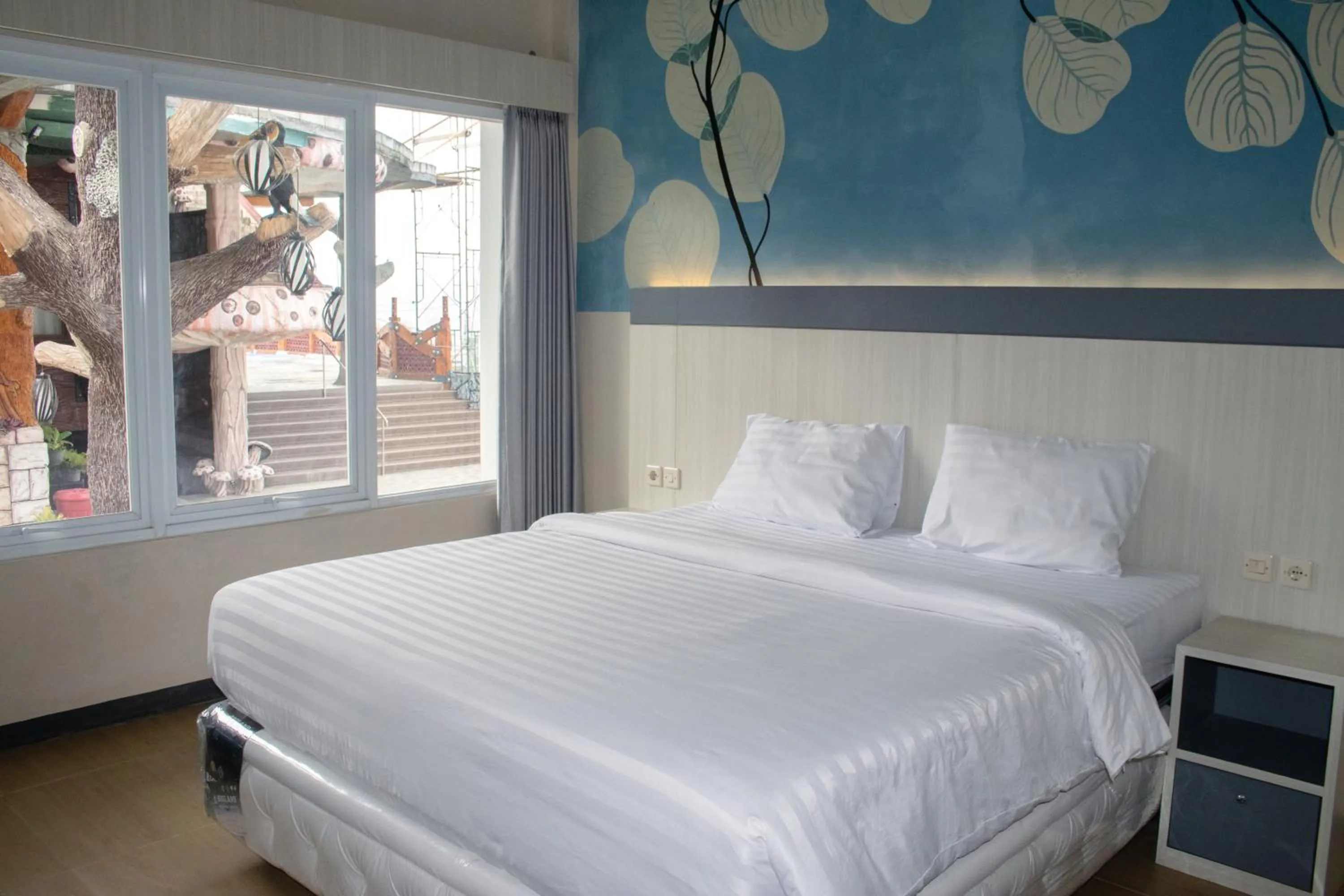 Bedroom, Bed in Azana BeSt Hotel Batu