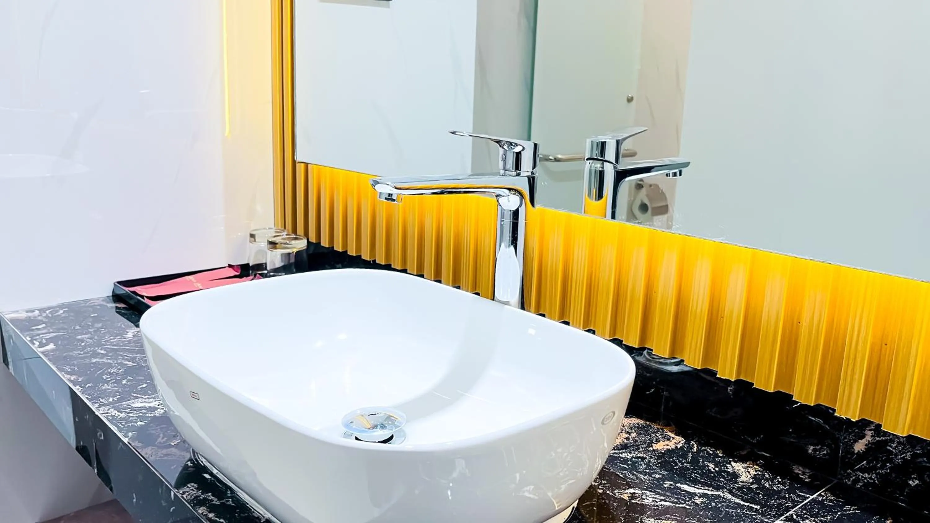 Toilet in Azana BeSt Hotel Batu