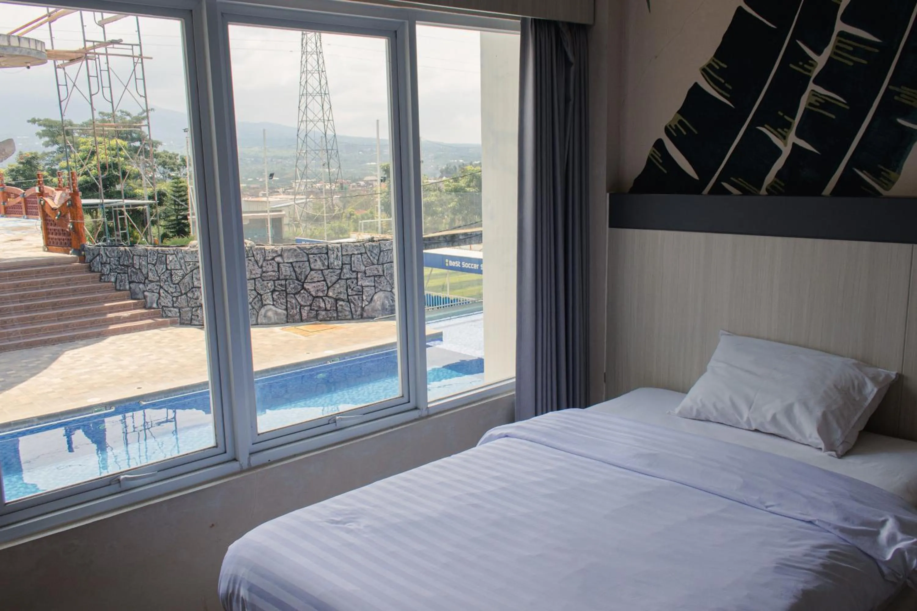 Bedroom, Bed in Azana BeSt Hotel Batu