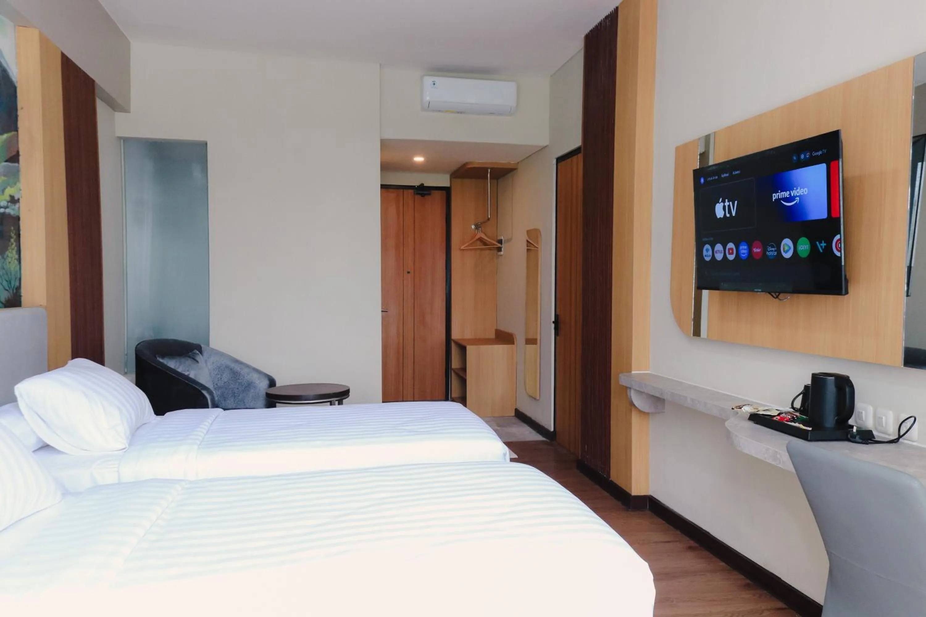 Bed in Azana BeSt Hotel Batu
