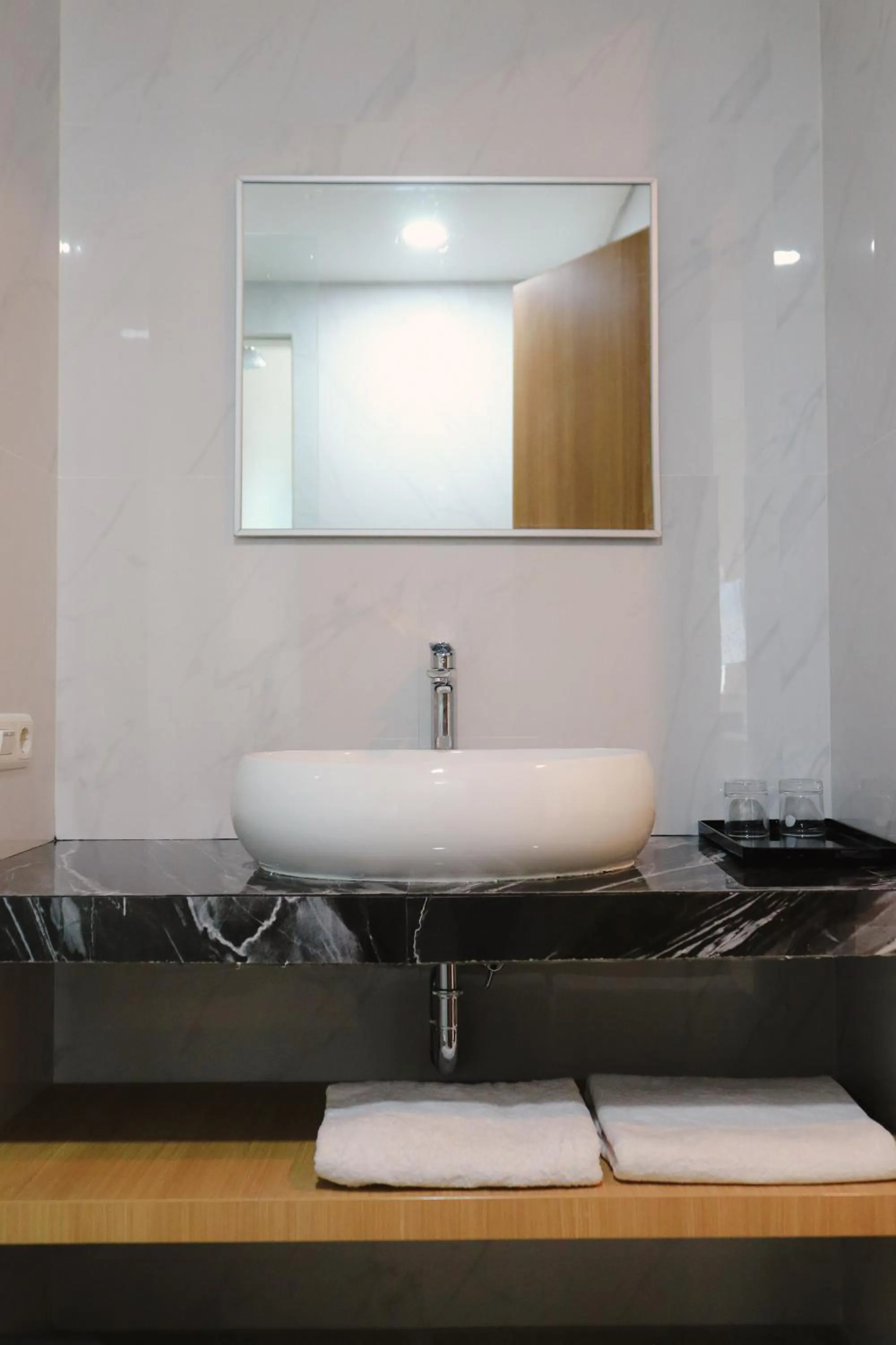 Bathroom in Azana BeSt Hotel Batu