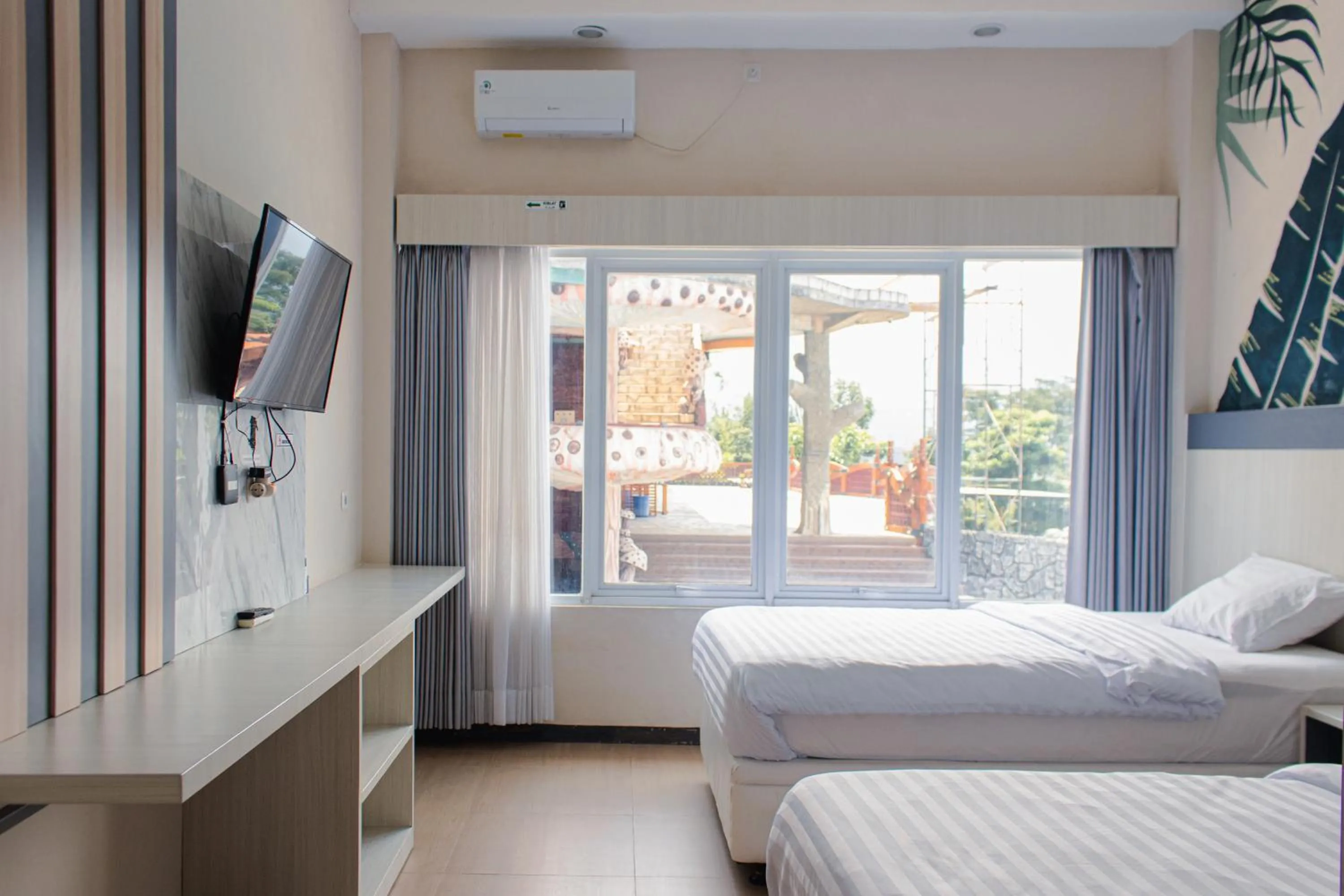 Bedroom, Bed in Azana BeSt Hotel Batu