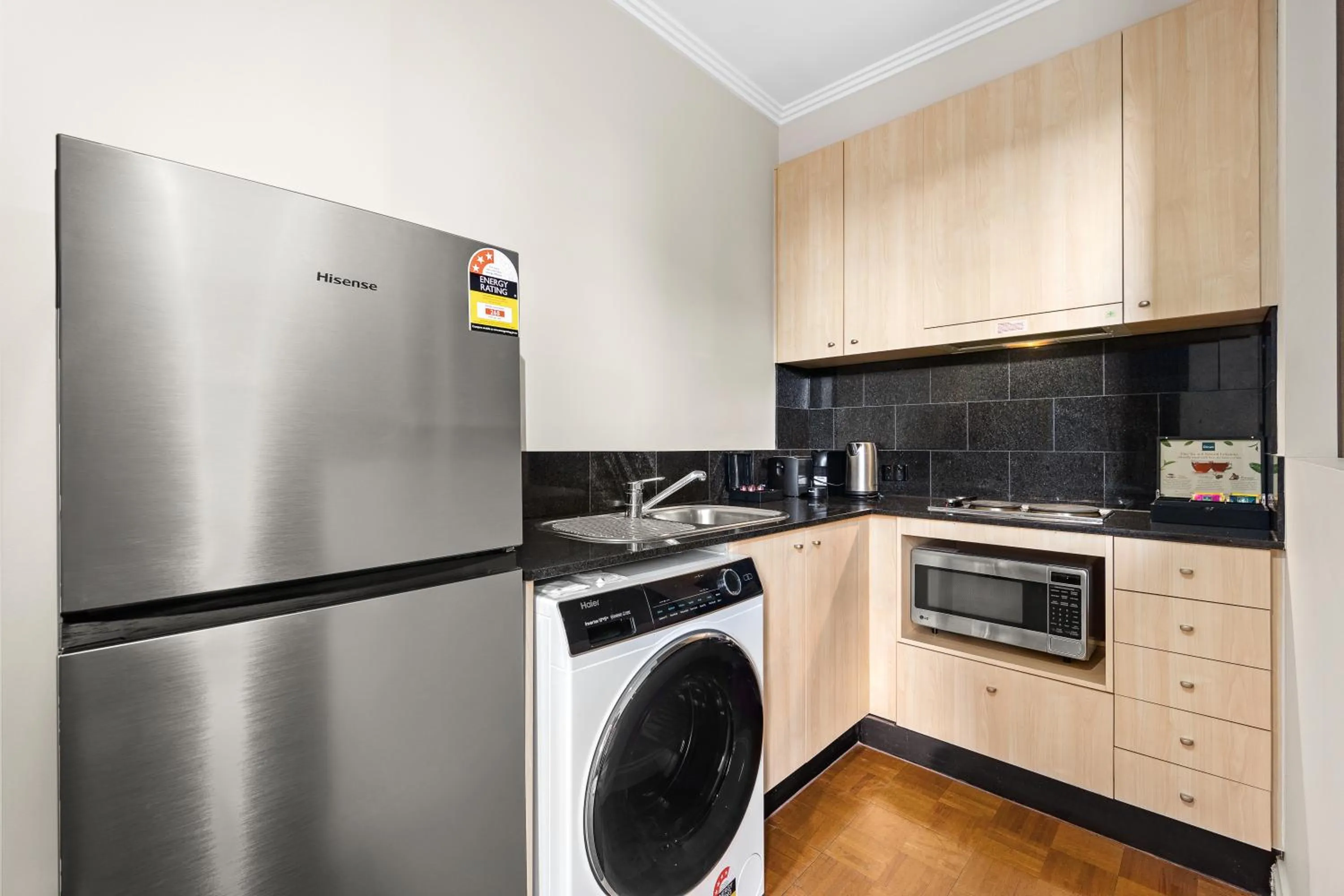 Kitchen or kitchenette in Melbourne City Suites