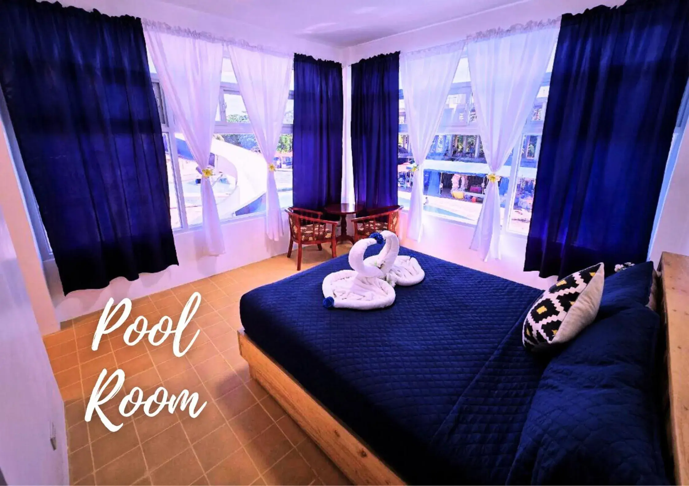 Bed in The Blessed Purple Bamboo Beach Resort Bed in The Blessed Purple Bamboo Beach Resort