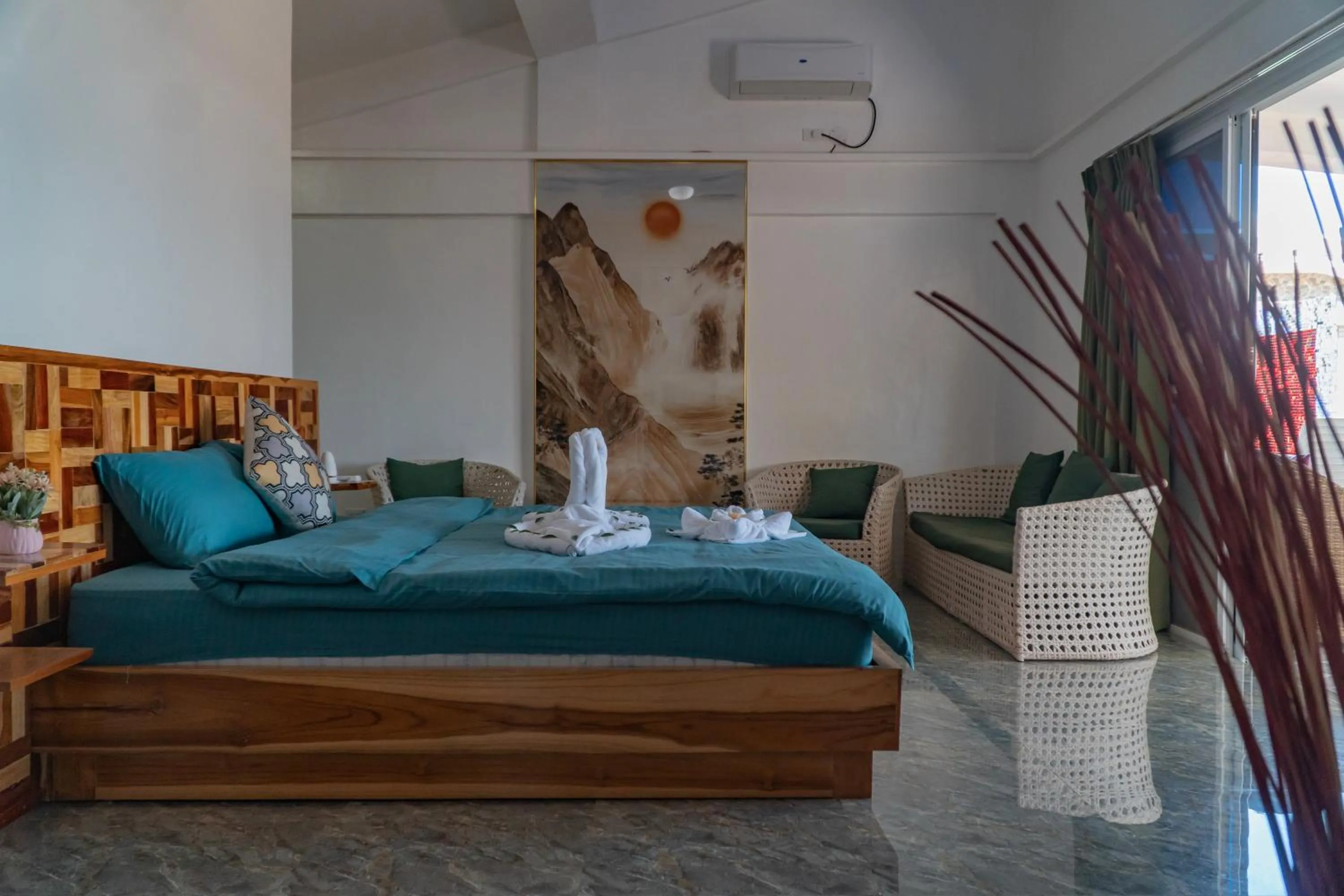 Bed in The Blessed Purple Bamboo Beach Resort