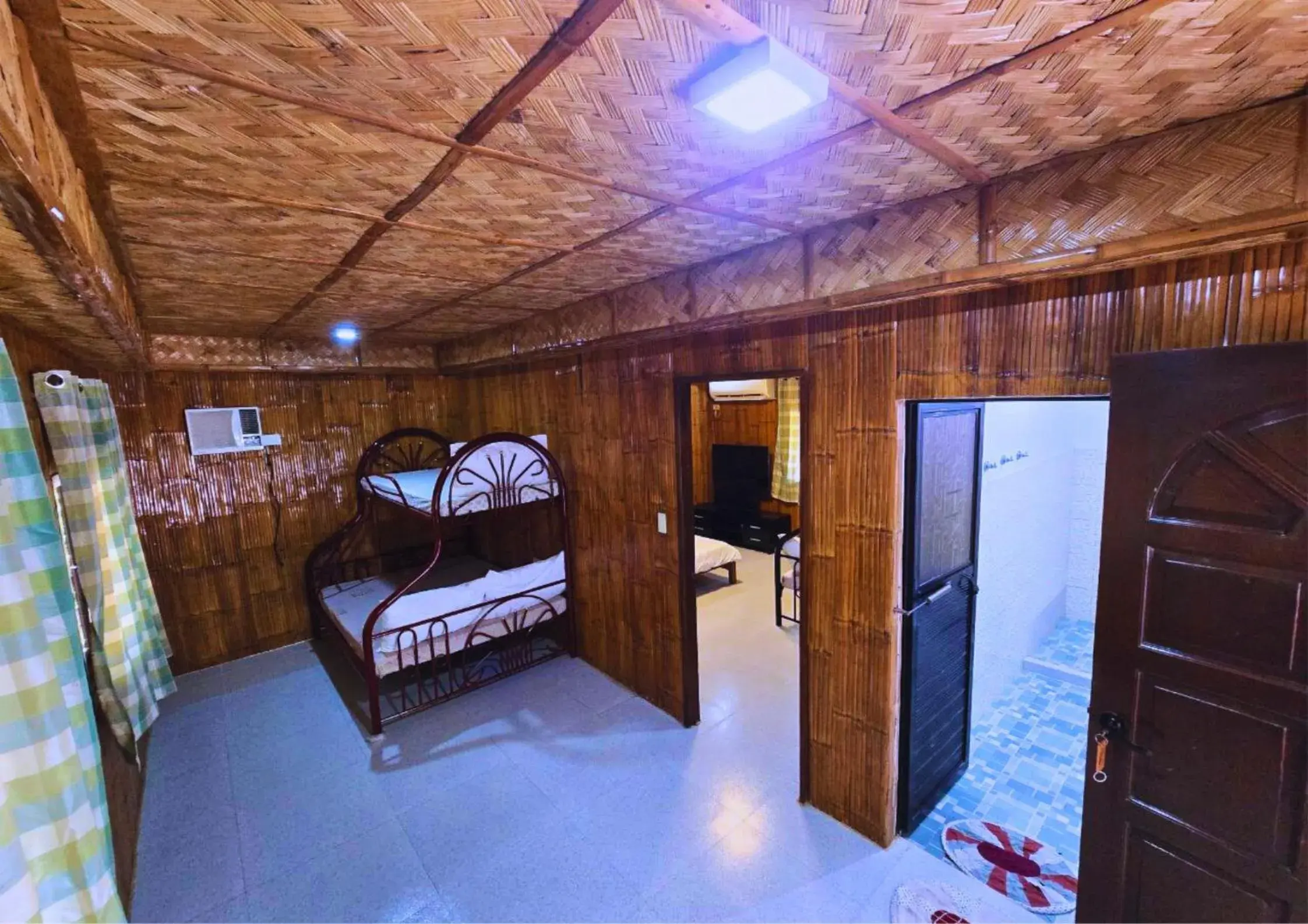 Bed in The Blessed Purple Bamboo Beach Resort Bed in The Blessed Purple Bamboo Beach Resort