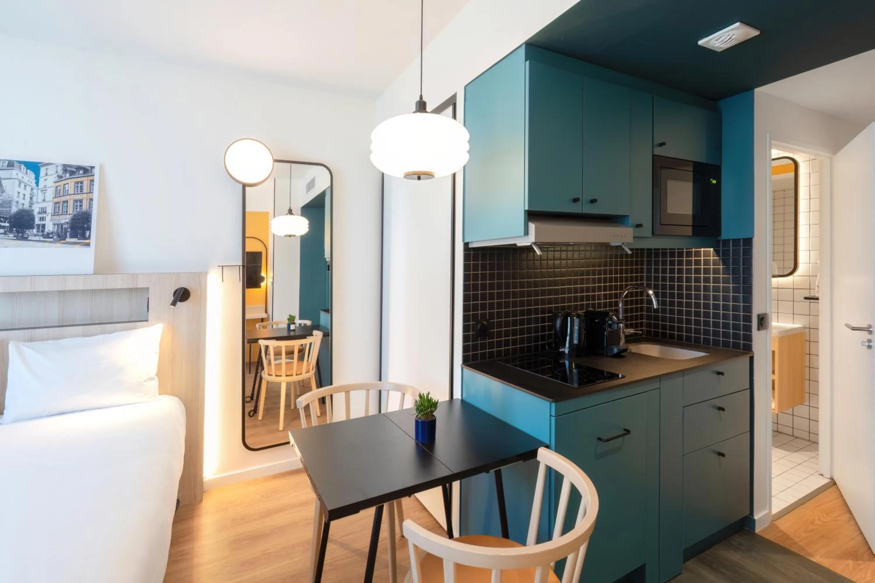 Kitchen or kitchenette in Aparthotel Adagio Access Rouen Centre Cathédrale