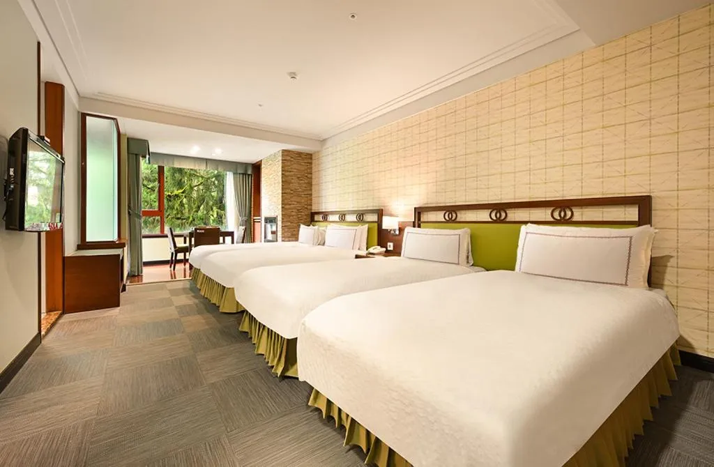Bed in Alishan Hotel
