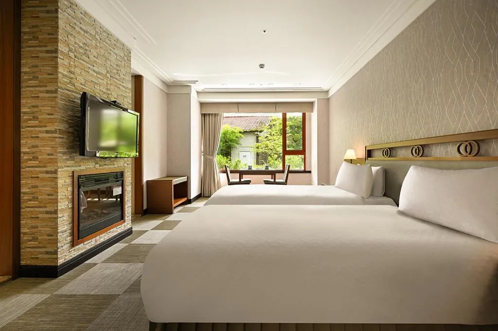 Bed in Alishan Hotel