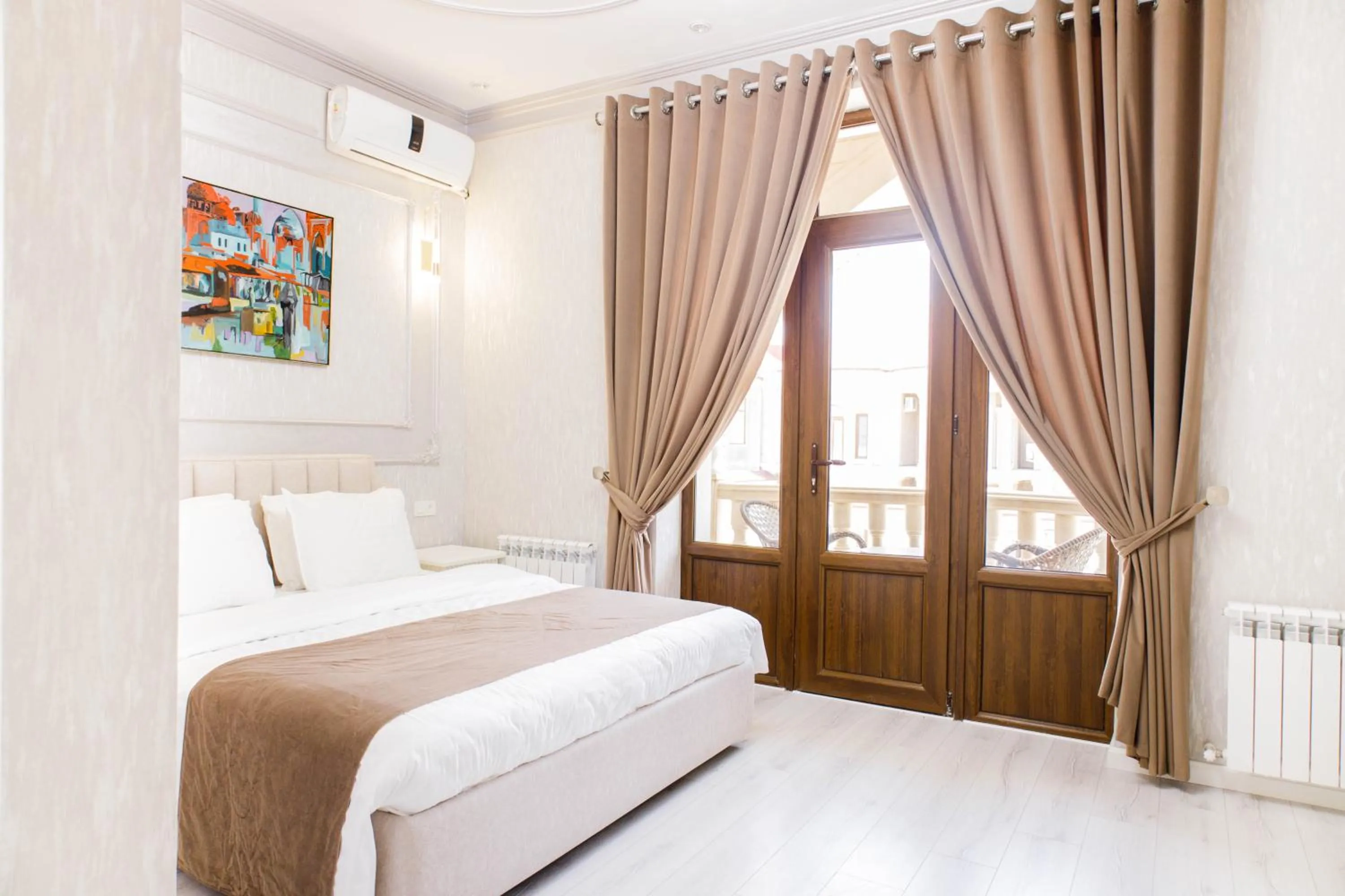 Bed in Hotel Dali Samarkand