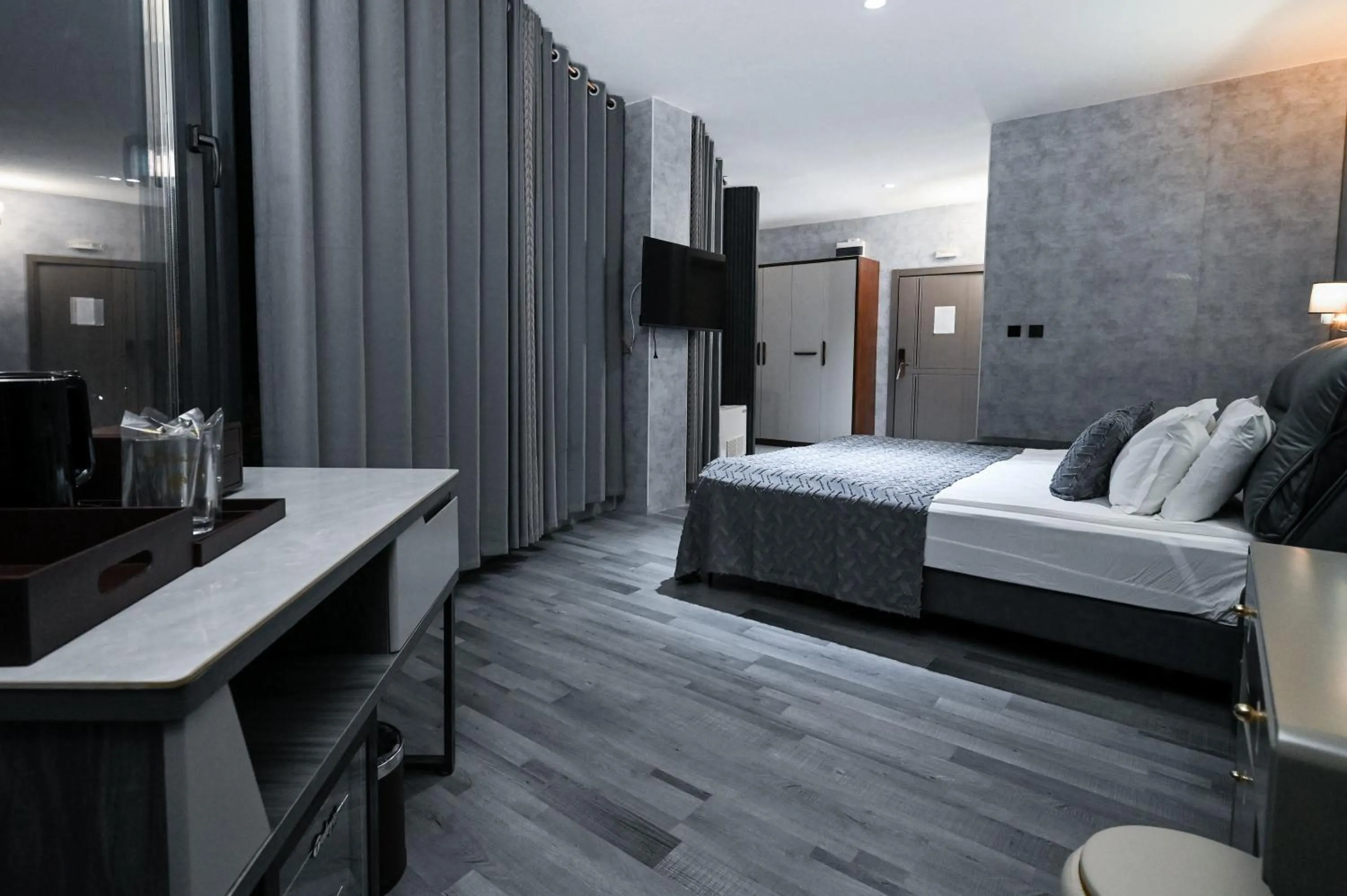 Bed in Grey Star Hotel