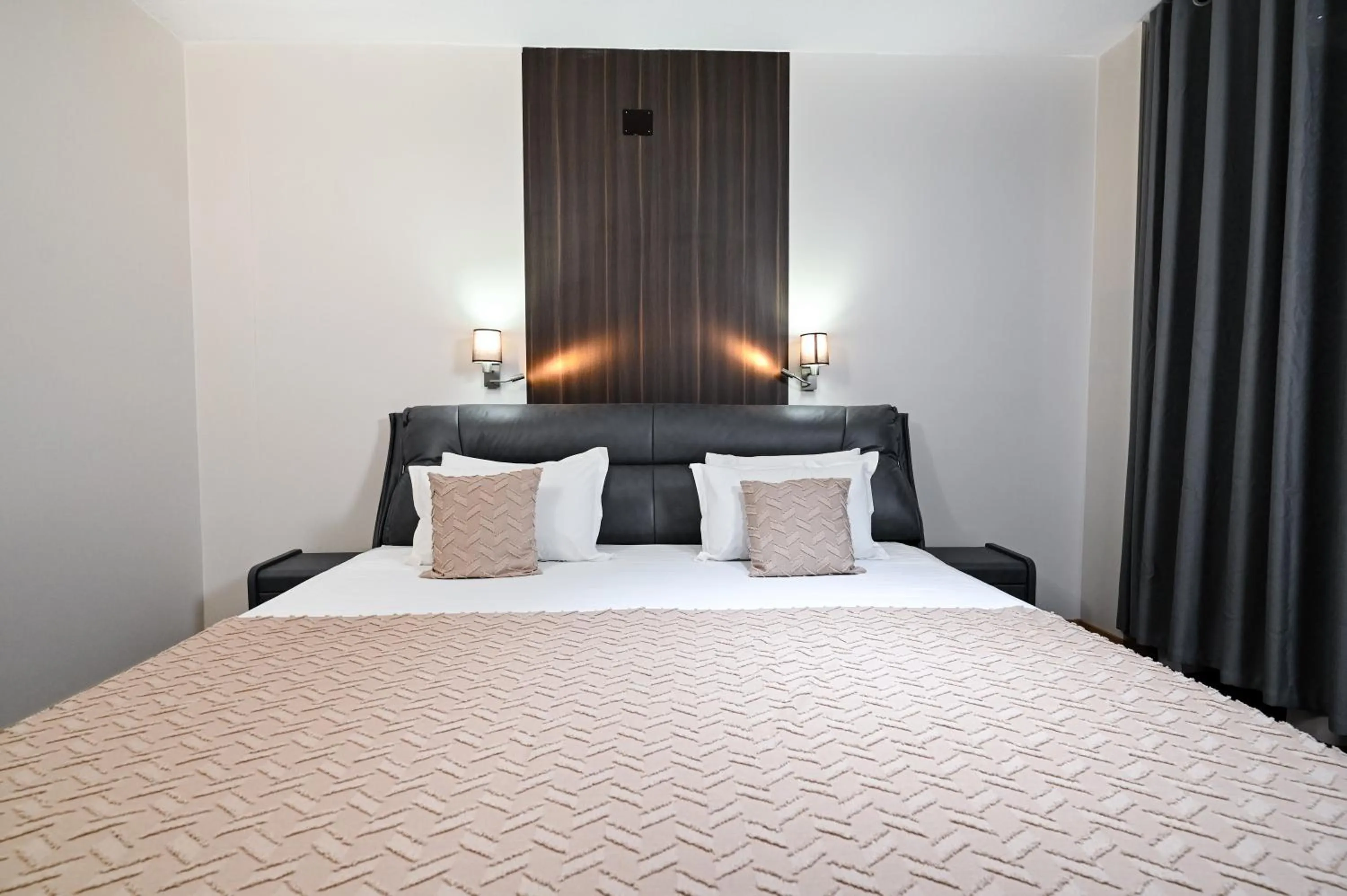 Bed in Grey Star Hotel