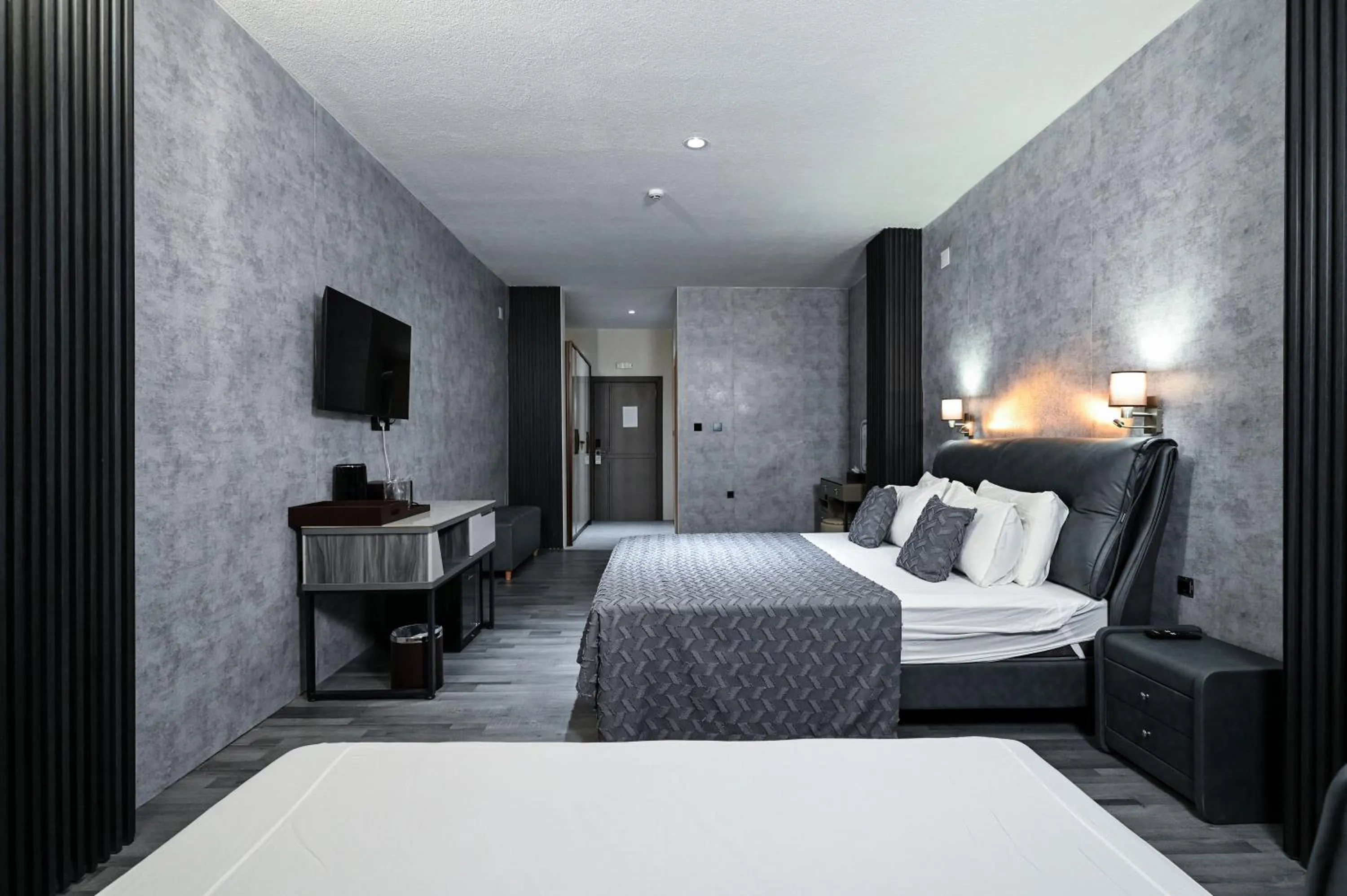 Bed in Grey Star Hotel